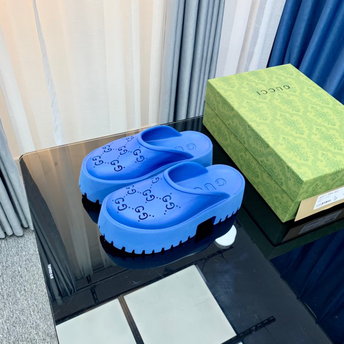 Gucci perforated GG platform mules Blue