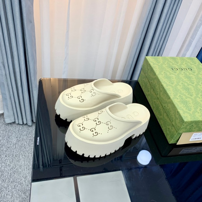Gucci perforated GG platform mules White