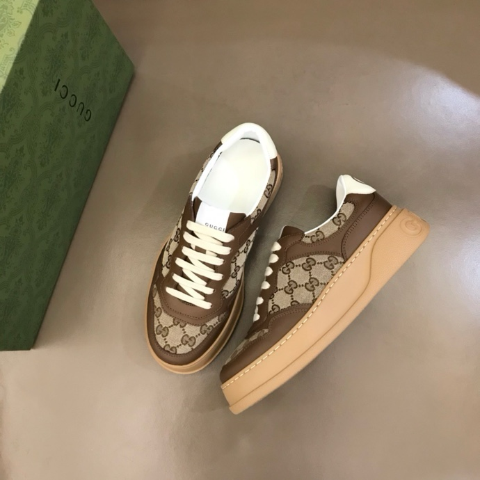 Gucci GG embossed sneakers Brown