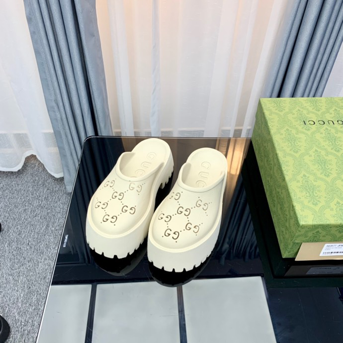 Gucci perforated GG platform mules White