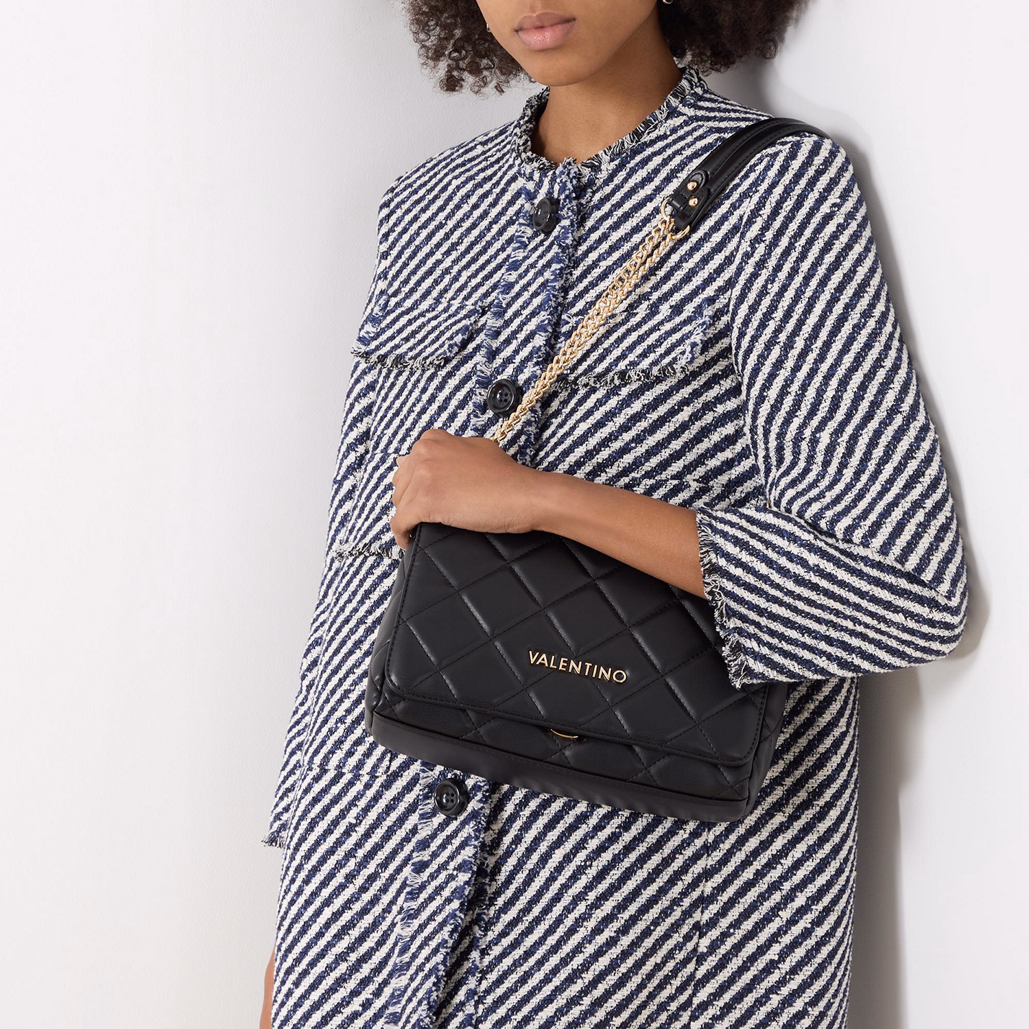 Ocarina Chain Flap Crossbody Bag