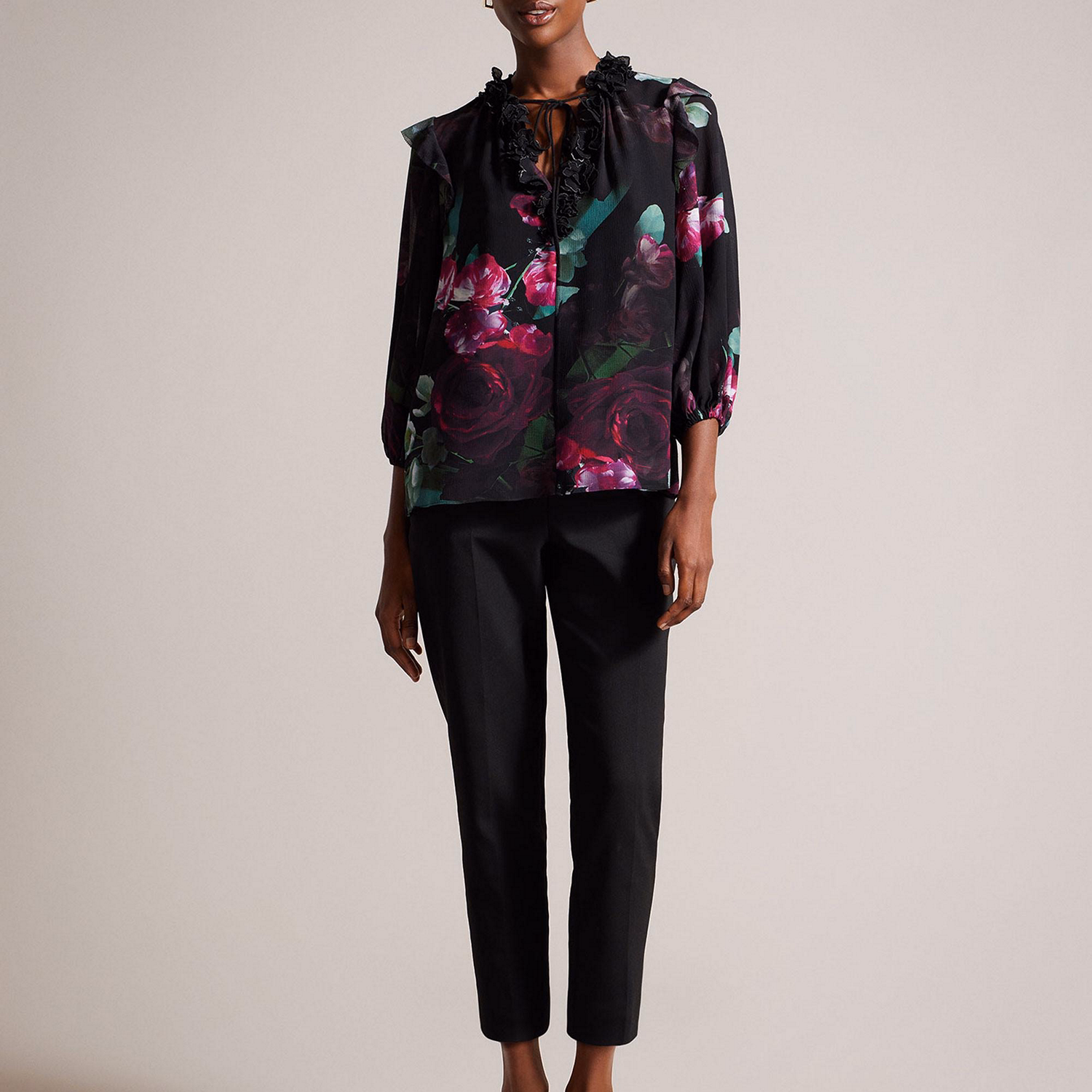 Faiziaa Floral Appliqué V-Neck Top