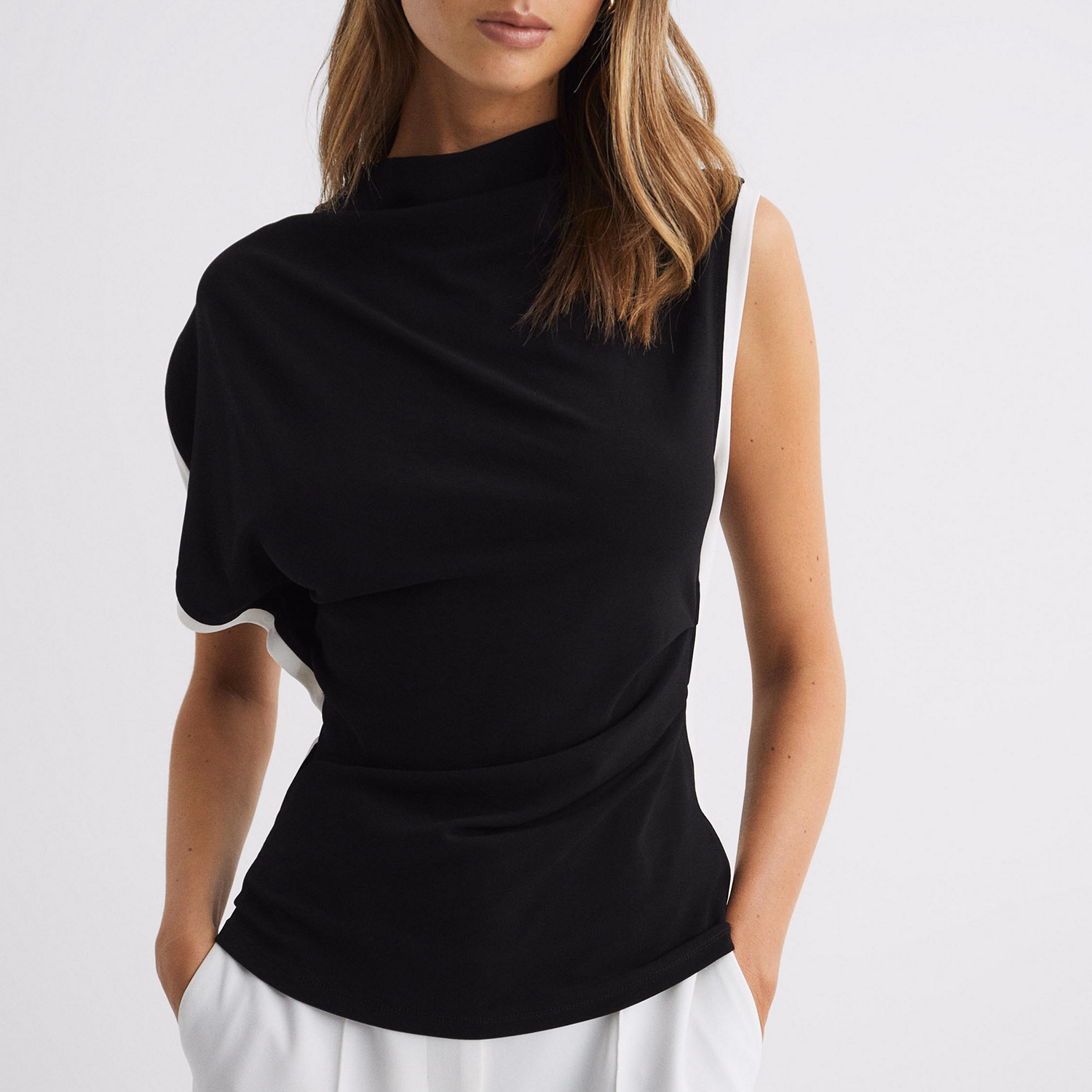 Eva Asymmetric Contrast Trim Top