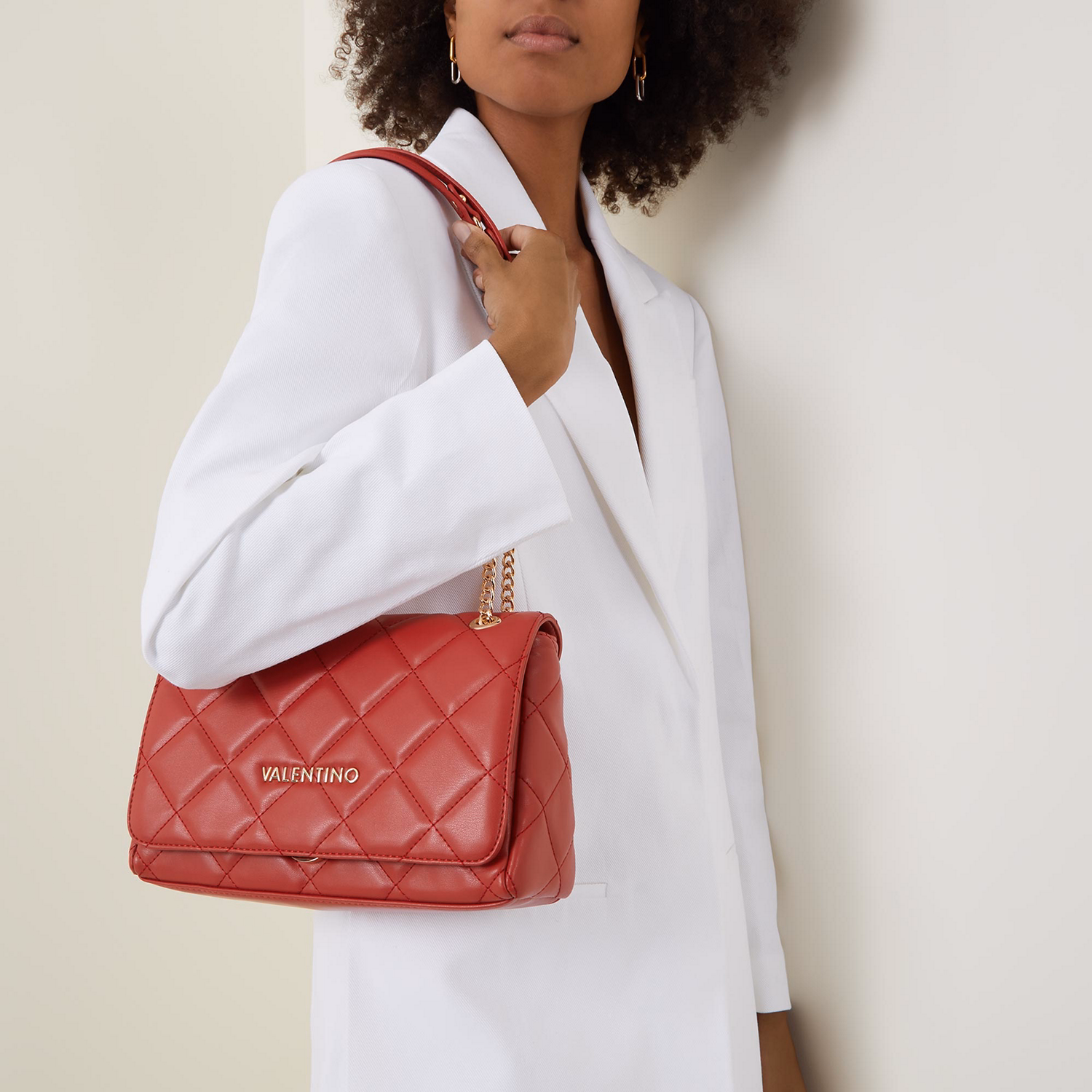 Ocarina Chain Flap Crossbody Bag