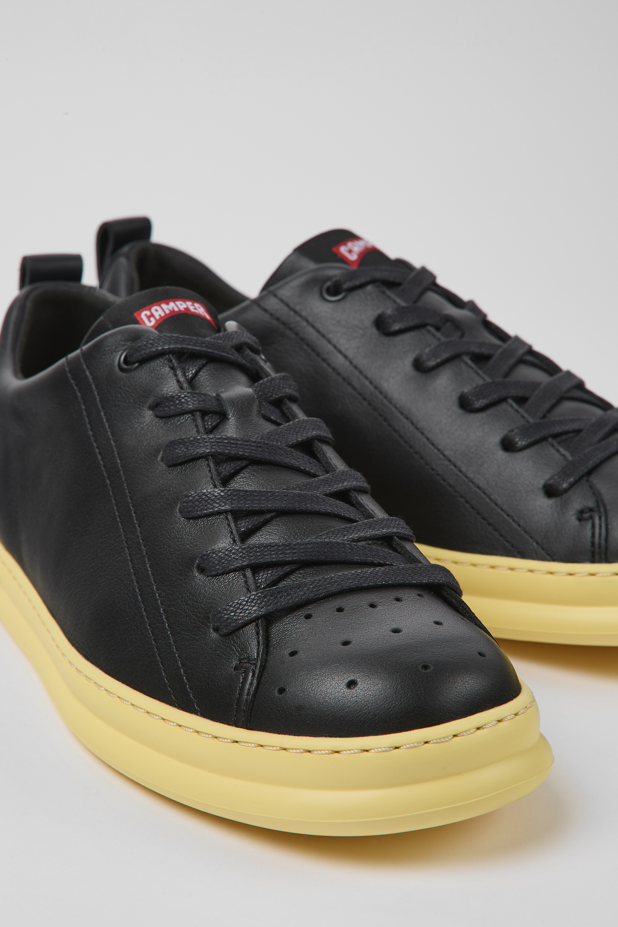 Runner - Black and yellow leather sneakers for men