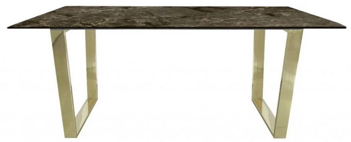 Casa Padrino mesa de comedor de lujo marr¨®n / oro 180 x 90 x A. 75 cm - Mesa de comedor rectangular con tapa de m¨¢rmol sint¨¦tico y patas de acero - Muebles de comedor