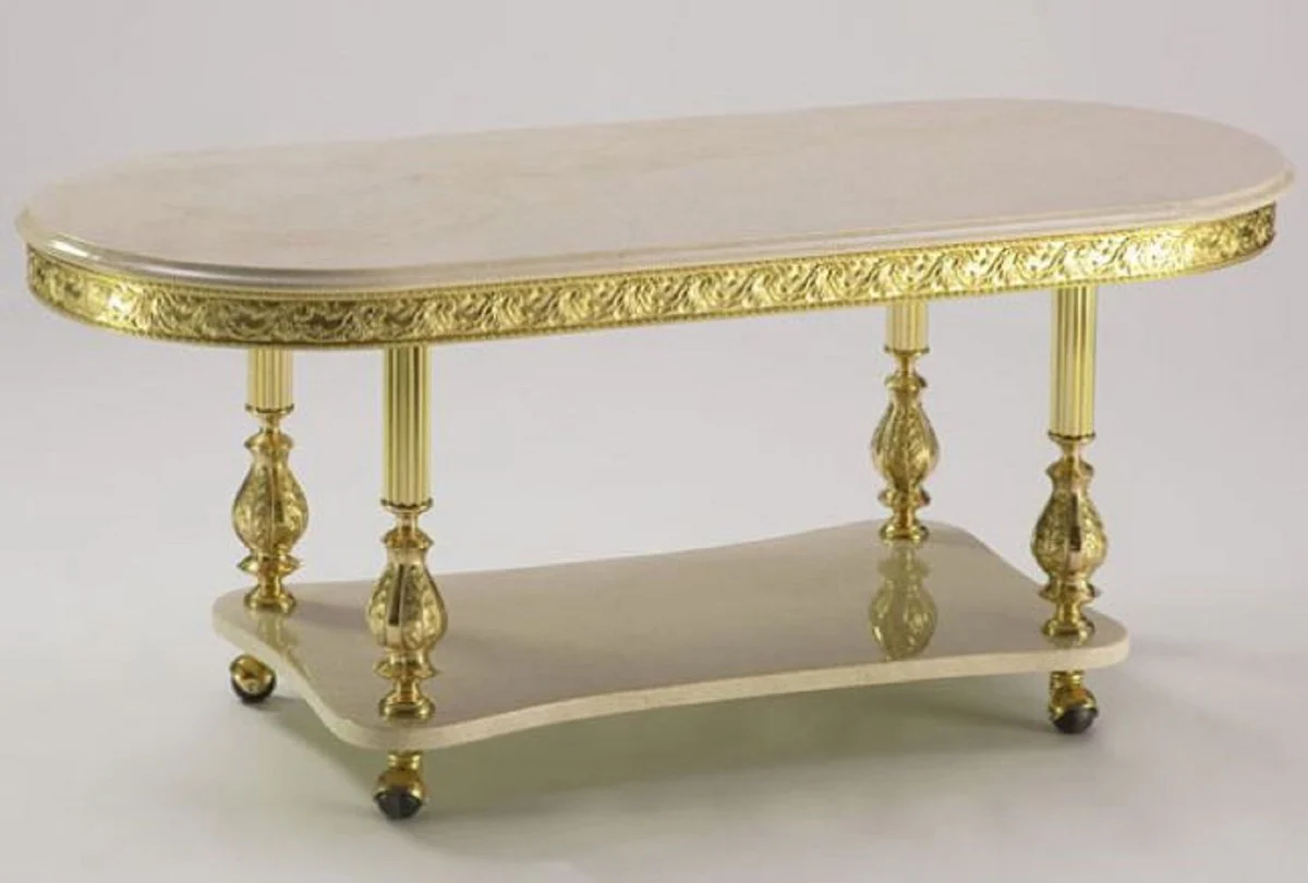 Casa Padrino mesa de centro barroco de lujo crema / oro 120 x 50 x A. 43 cm - Mesa de sal¨®n ovalada de estilo barroco con tableros de m¨¢rmol y ruedas - Muebles barrocos - Hecho en Italia