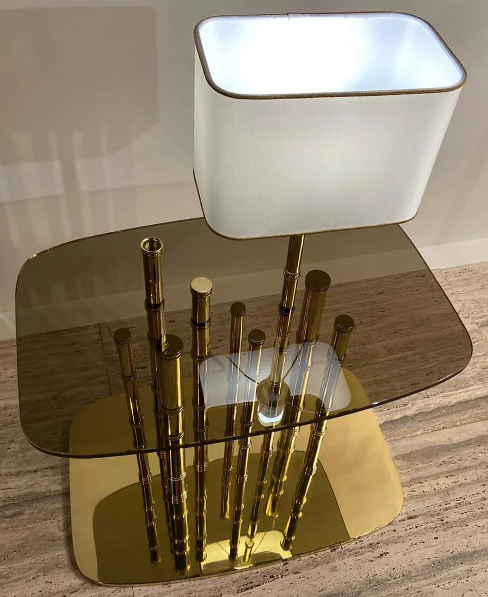 Casa Padrino mesa auxiliar de dise?o de lujo bamb¨² oro / negro / blanco 70 x 45 x A. 40 cm - Mesita de noche de lat¨®n chapado en oro con tapa de vidrio y l¨¢mpara de mesa integrada - Muebles de Hotel