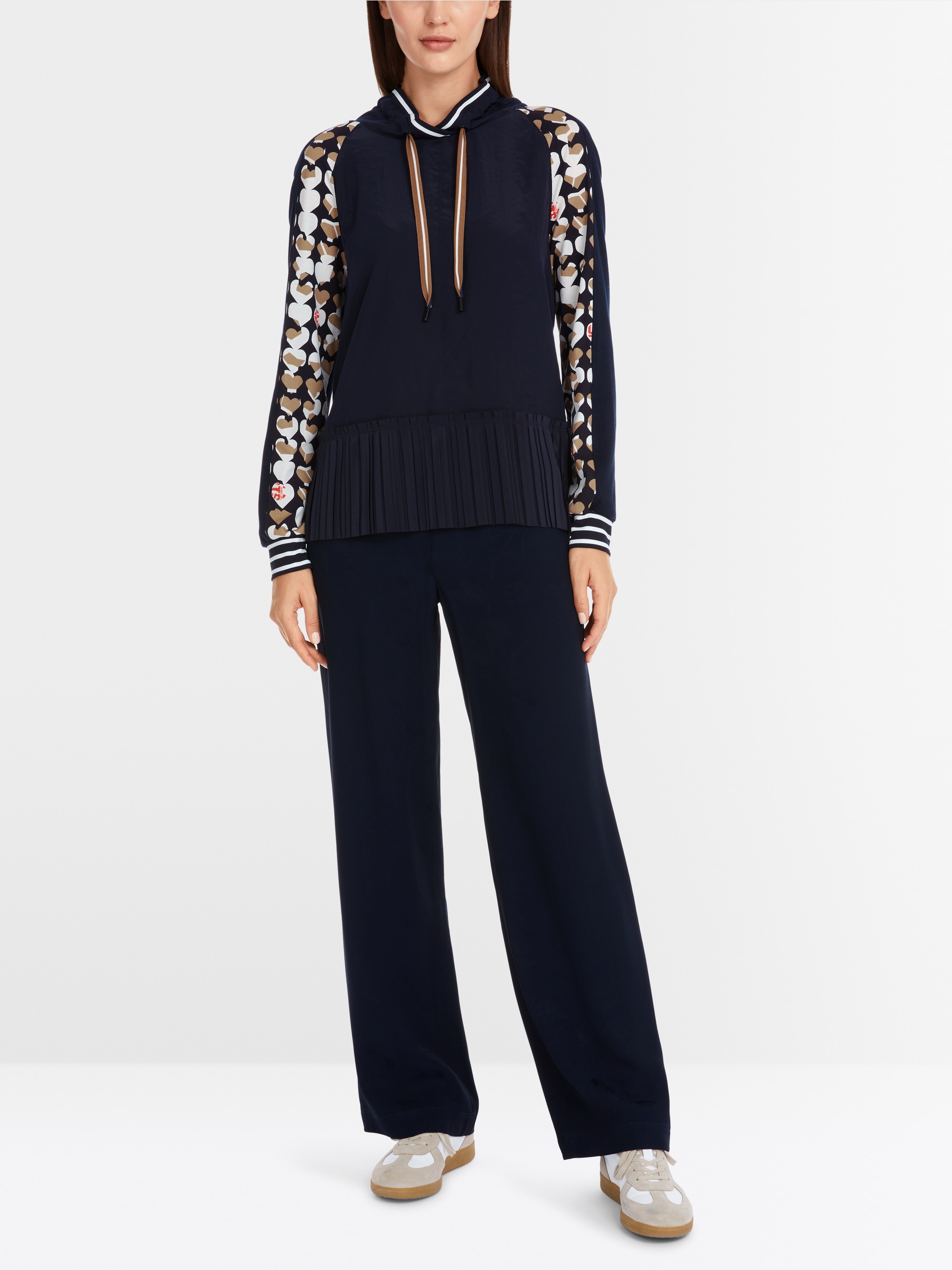 Marc-Cain Loose blouse with pleated peplum