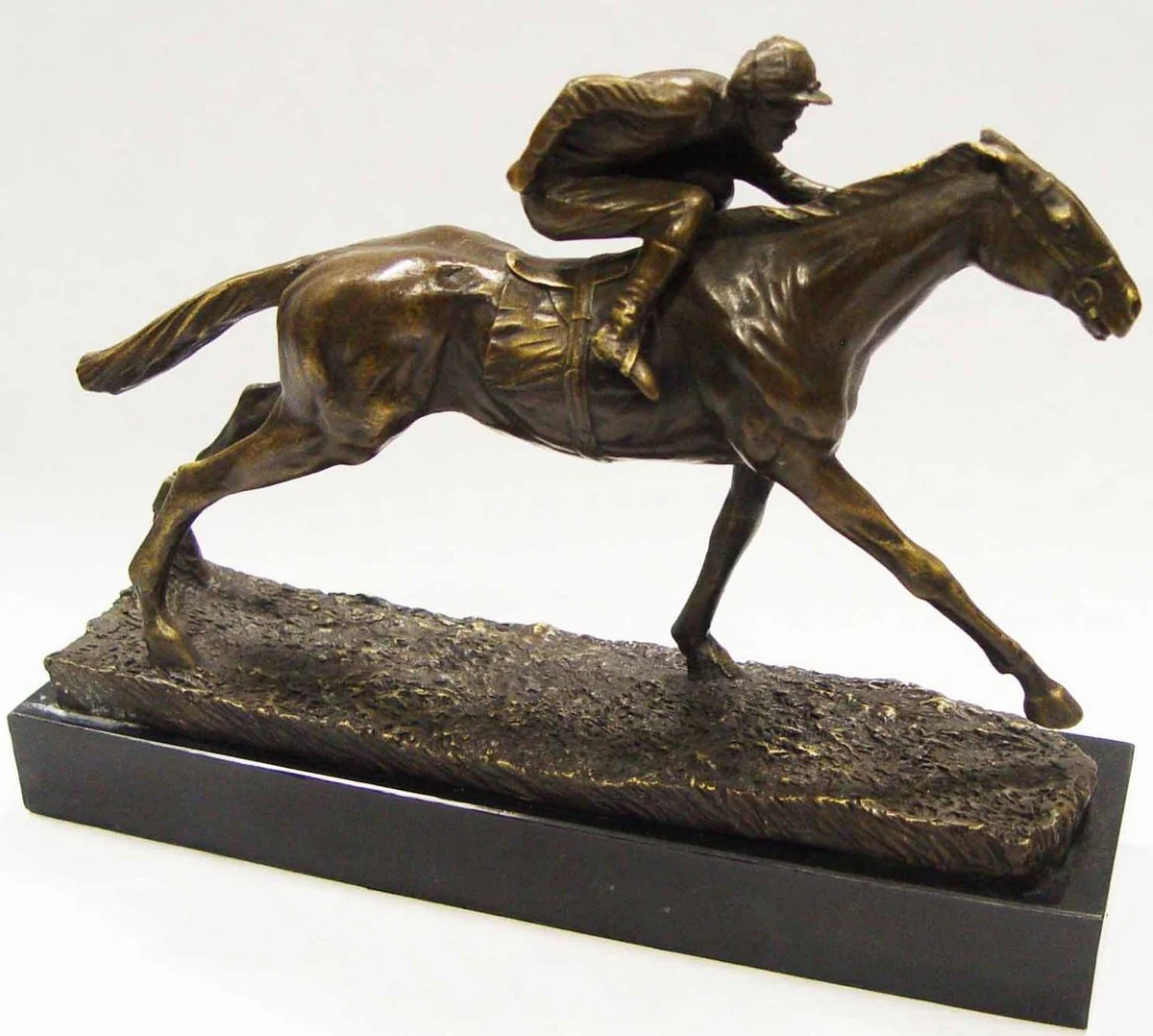 Casa Padrino escultura de bronce de lujo jinete con caballo bronce / oro / negro 29 x 7,9 x H. 21,4 cm - Figura Deco