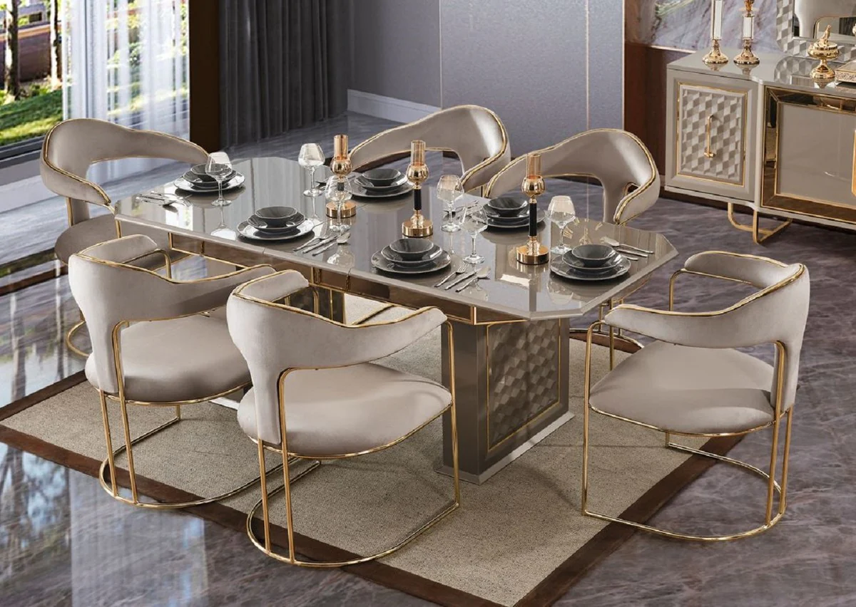 Casa Padrino conjunto de comedor Art Deco de lujo gris / oro - 1 Mesa de Comedor Extensible y 6 Sillas de Comedor con Reposabrazos - Muebles de comedor - Muebles Art Deco - Muebles de lujo