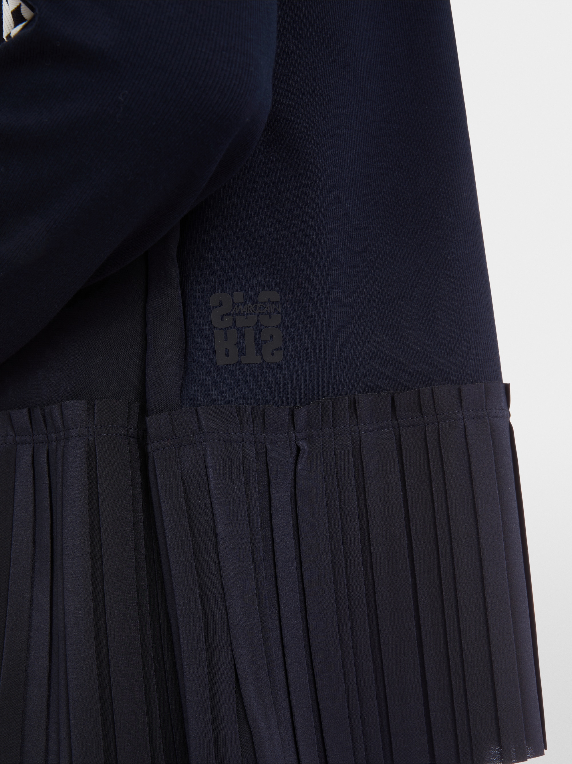 Marc-Cain Loose blouse with pleated peplum