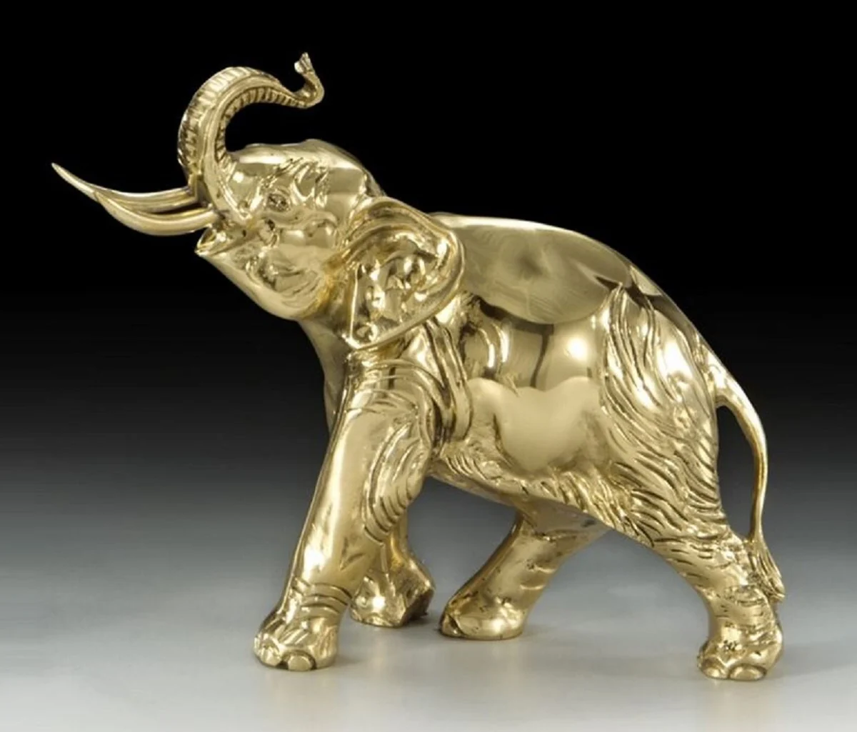 Casa Padrino escultura decorativa de bronce de lujo elefante oro 27 x A. 24 cm - Decoración de escritorio