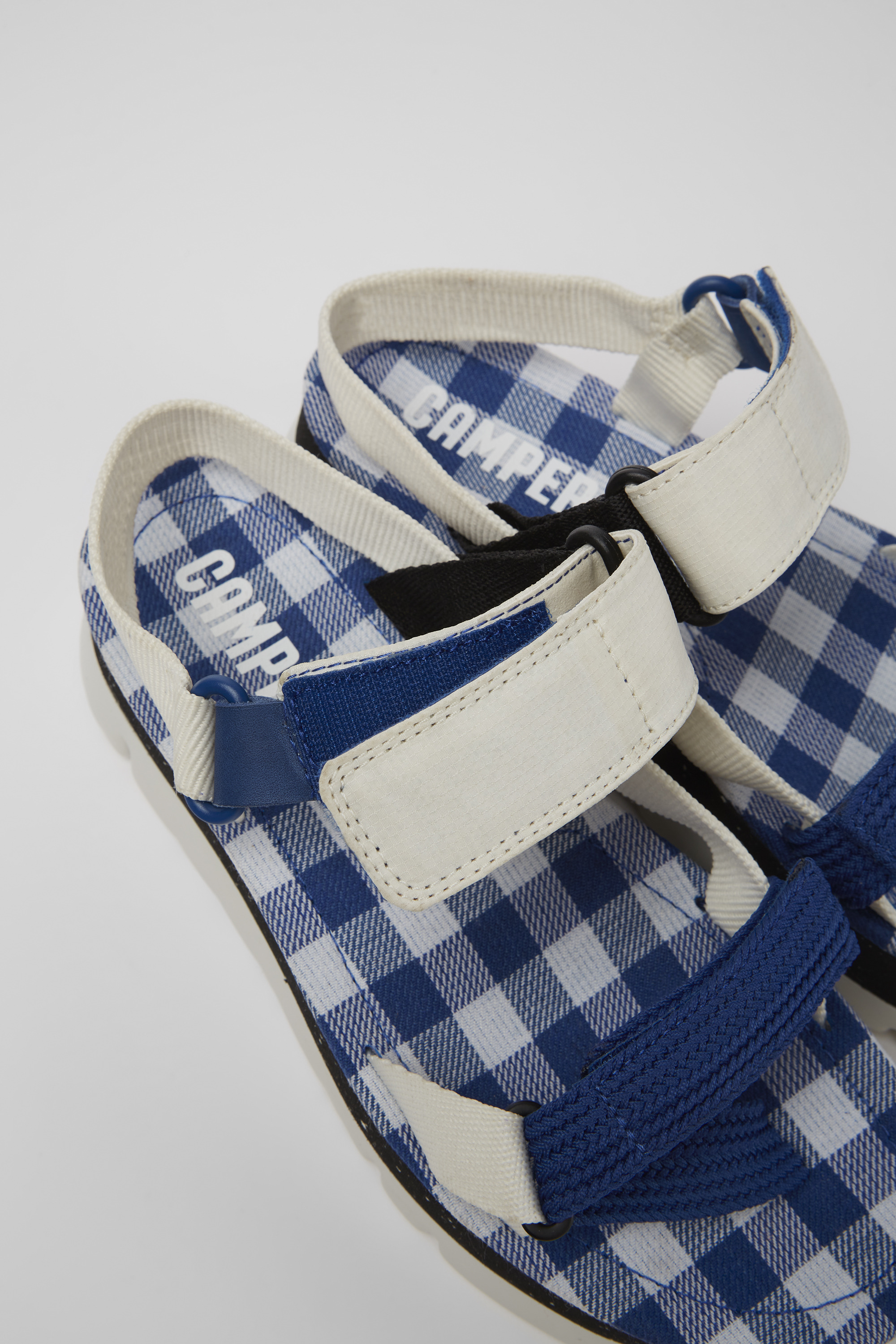 Oruga Up - White, blue, and black sandals for women