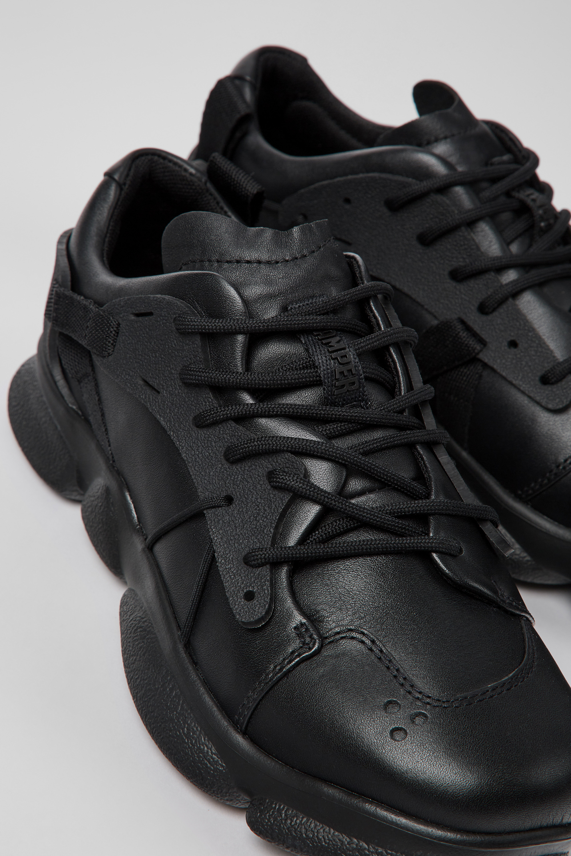Karst - Black leather and textile sneakers for women