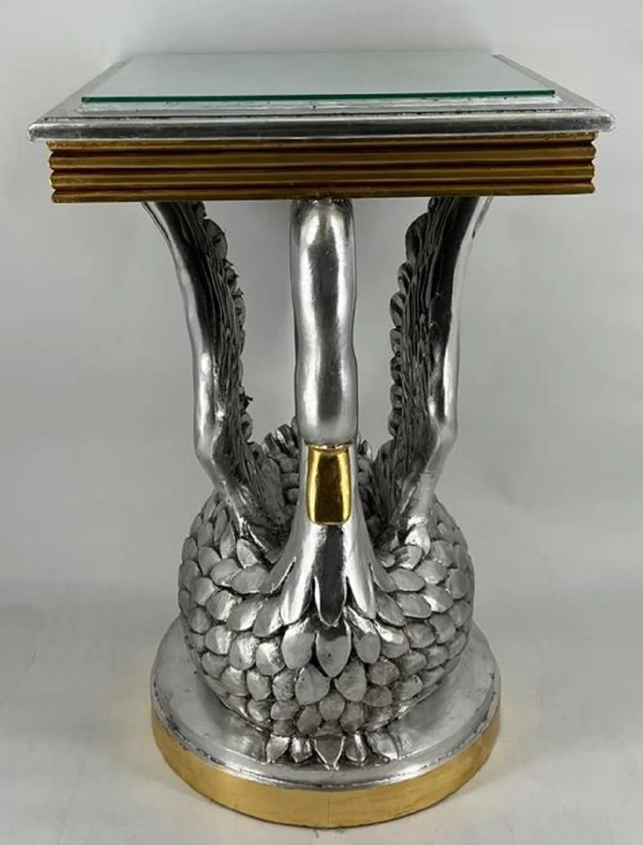 Casa Padrino mesa auxiliar barroco cisne con tapa de vidrio plata / oro A. 78 cm - Muebles barrocos