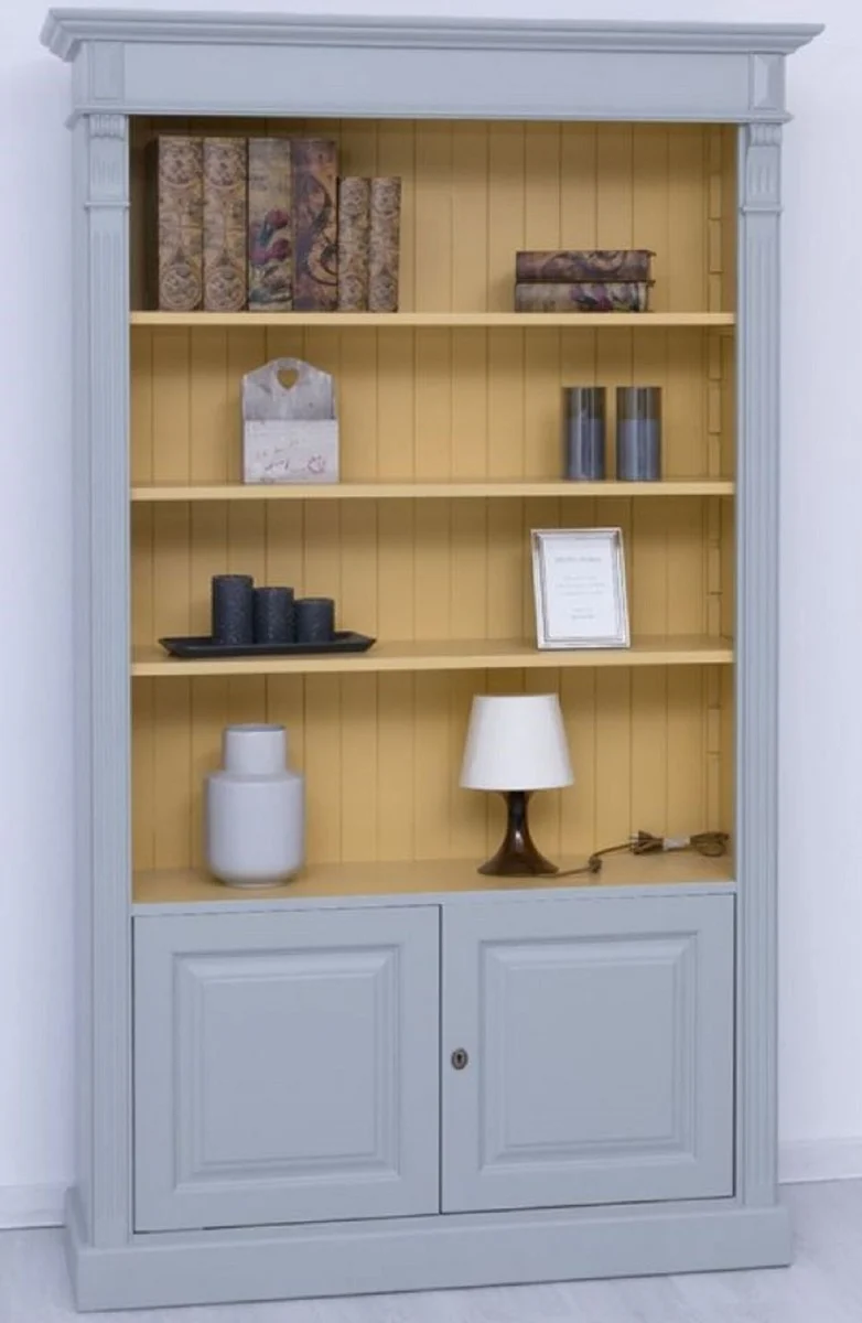 Casa Padrino armario de libros de estilo campestre gris / amarillo 120 x 39 x A. 197 cm - Armario de madera maciza - Armario de sala de estar - Armario de oficina - Muebles de estilo campestre