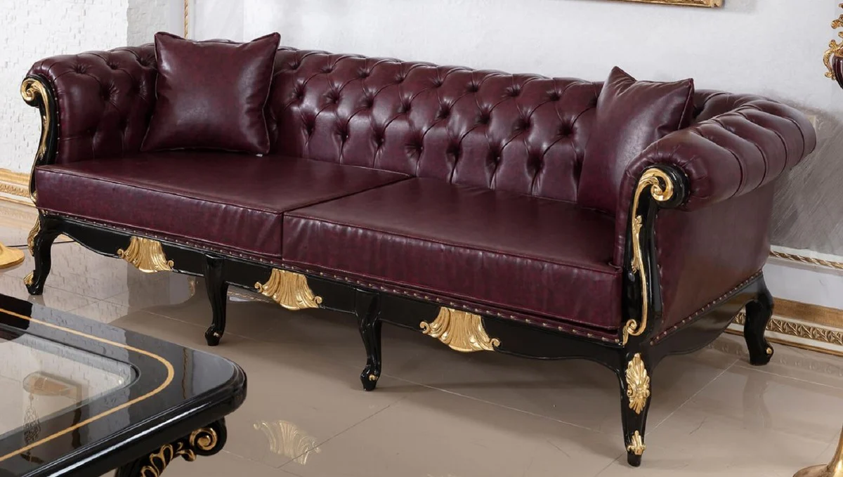 Casa Padrino sof¨¢ barroco Chesterfield de lujo rojo burdeos / negro / oro - Magn¨ªfico sof¨¢ de sal¨®n con fina cuero artificial - Muebles de Sal¨®n Barroco Chesterfield