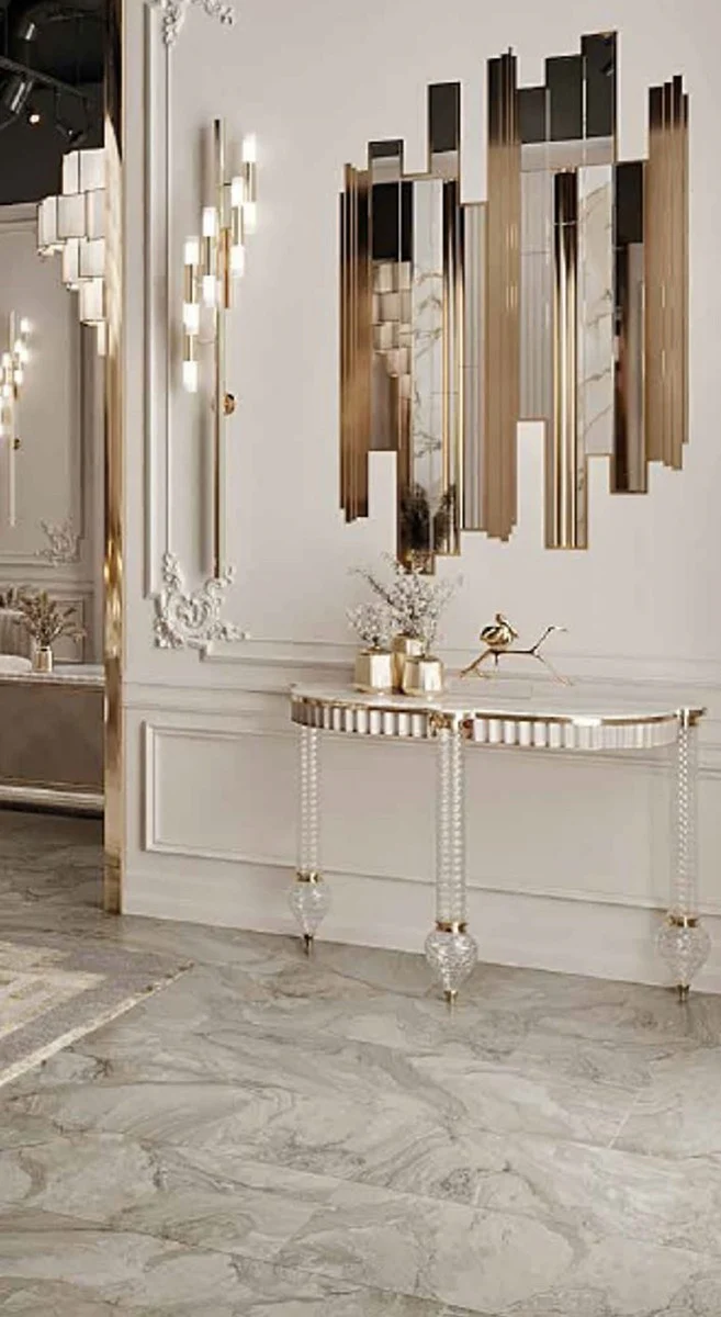 Casa Padrino consola Art Deco de lujo blanco / oro 150 x 45,5 x A. 77 cm - Mesa consola con tablero de m¨¢rmol artificial y elegantes patas de vidrio - Muebles de lujo - Muebles Art Deco