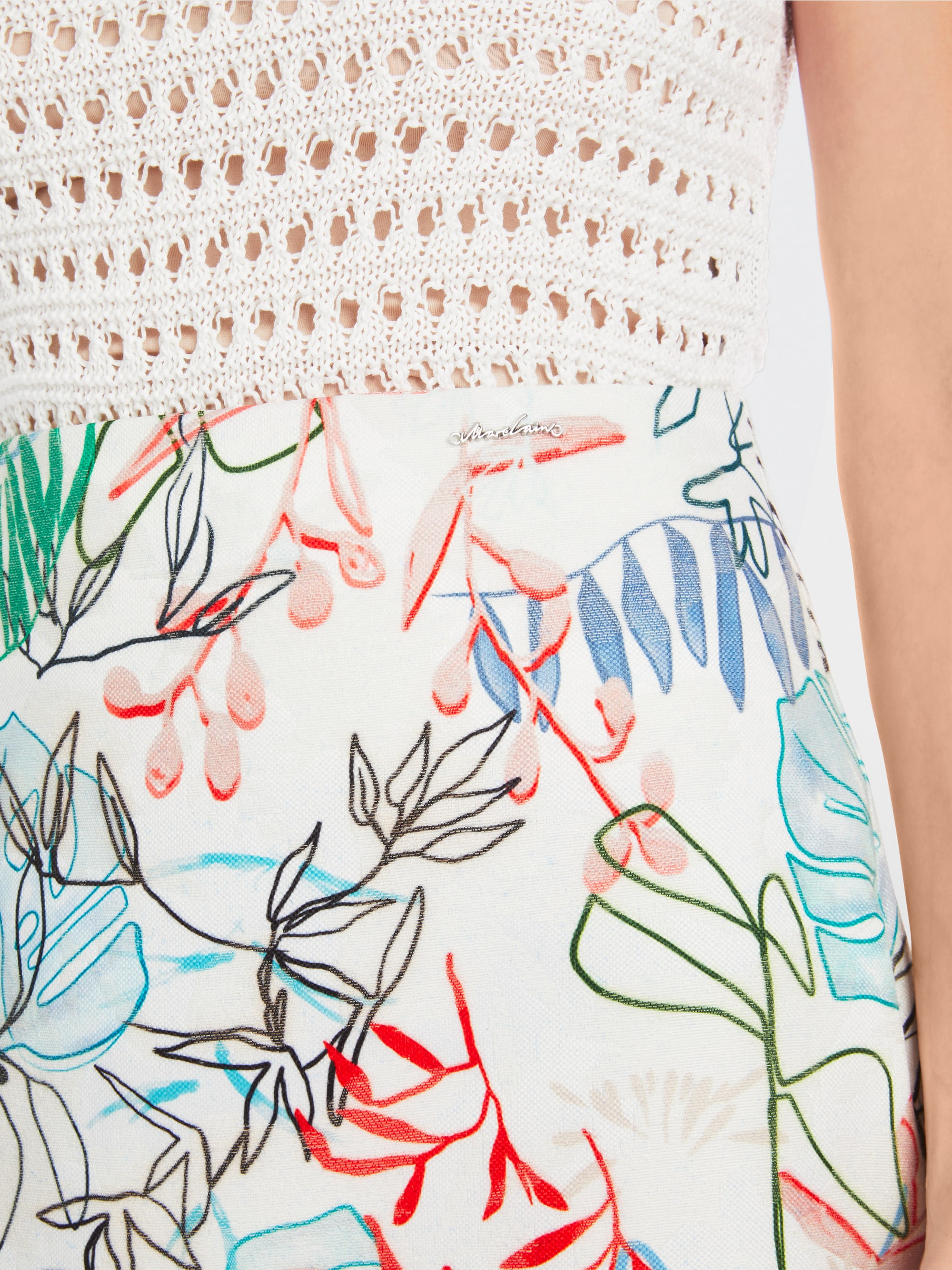 Marc-Cain Slim mini skirt with arty leaf motif