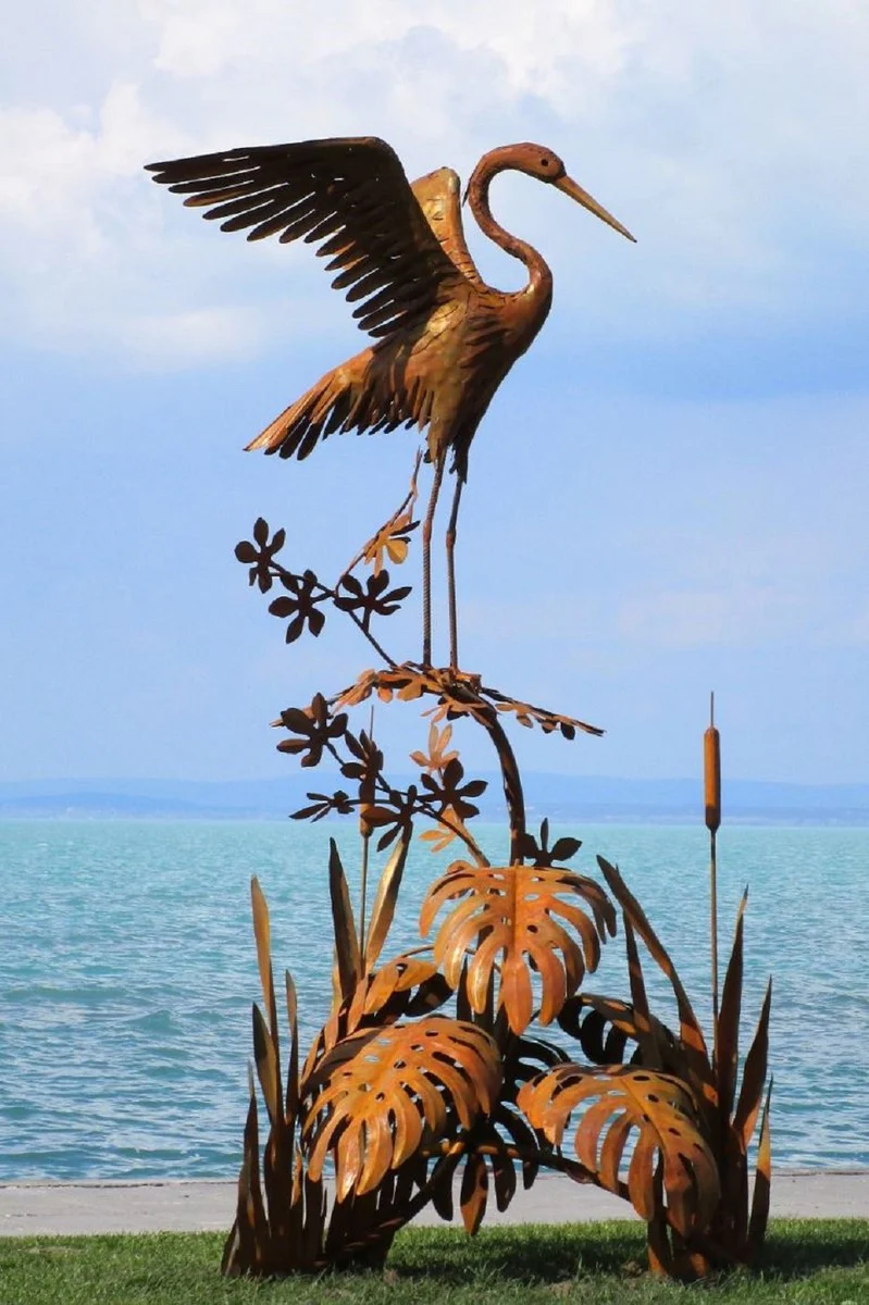Casa Padrino escultura de jardín de lujo de acero garza en rama oxido 103 x 108 x A. 218 cm - Figura de decoración de jardín hecha a mano - Decoración de jardín de lujo