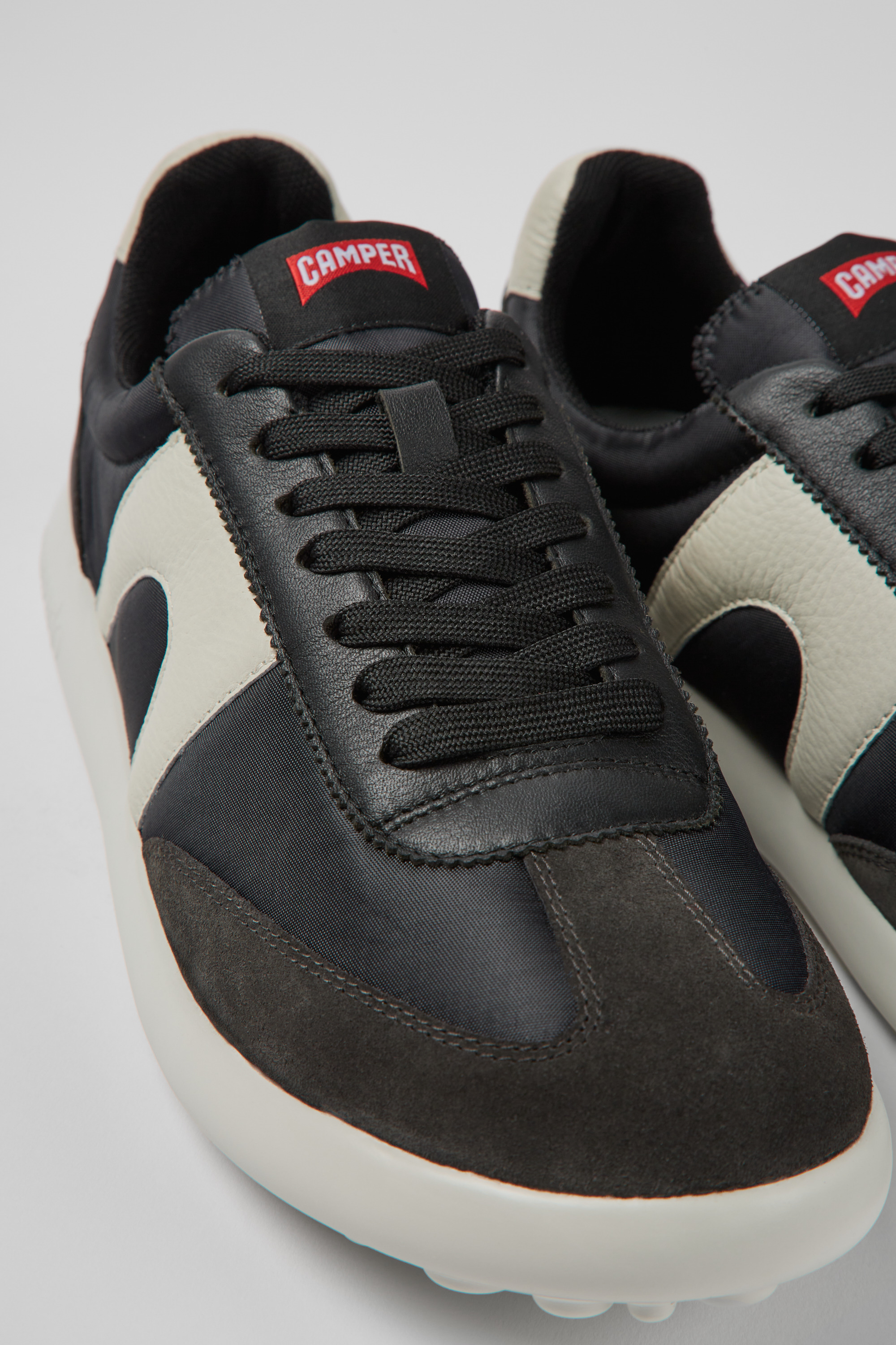 Pelotas XLite - White and black textile and leather sneakers for men