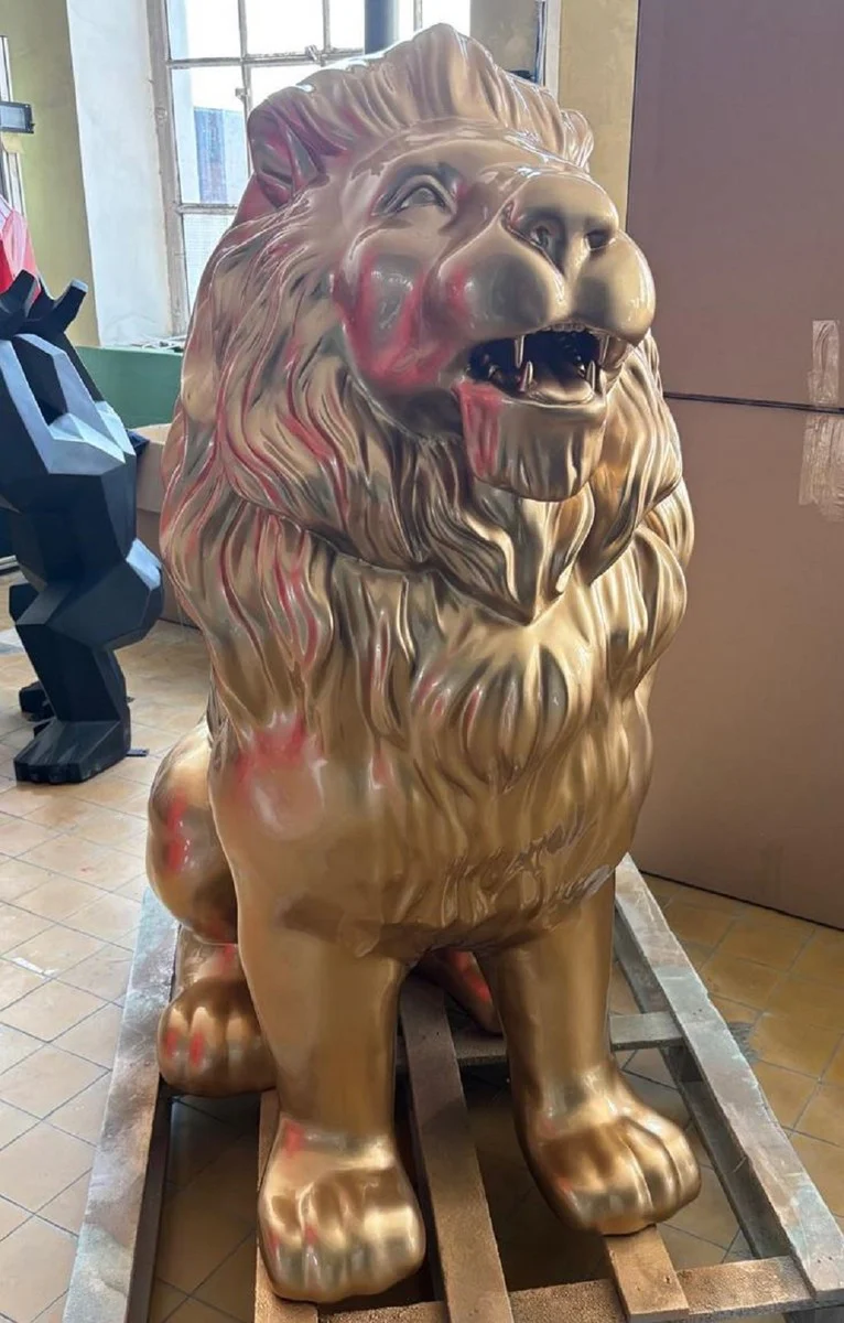 Casa Padrino escultura decorativa XXL le¨®n oro A. 143 cm - Figura decorativa de jard¨ªn