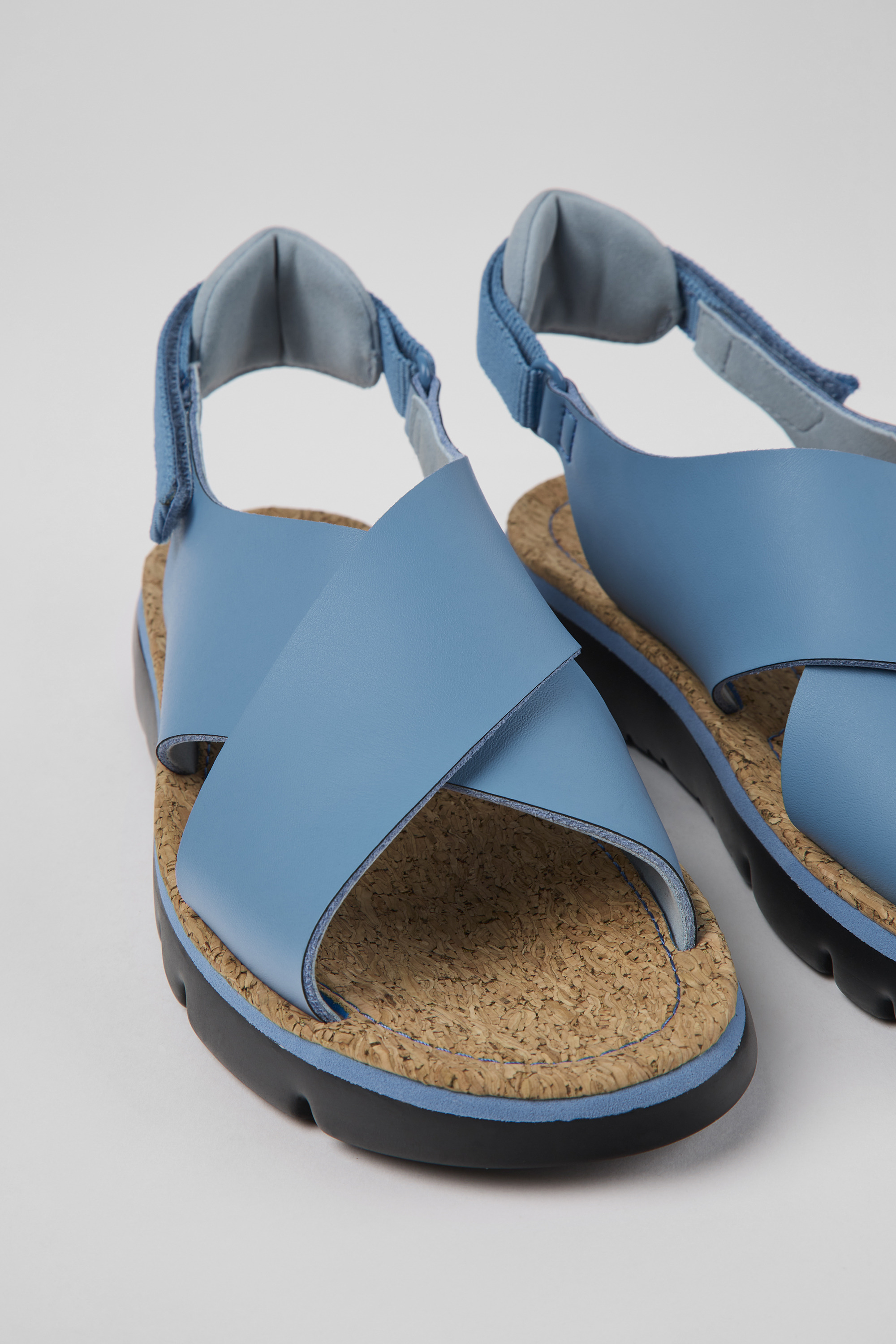 Oruga - Blue leather and textile sandals for women