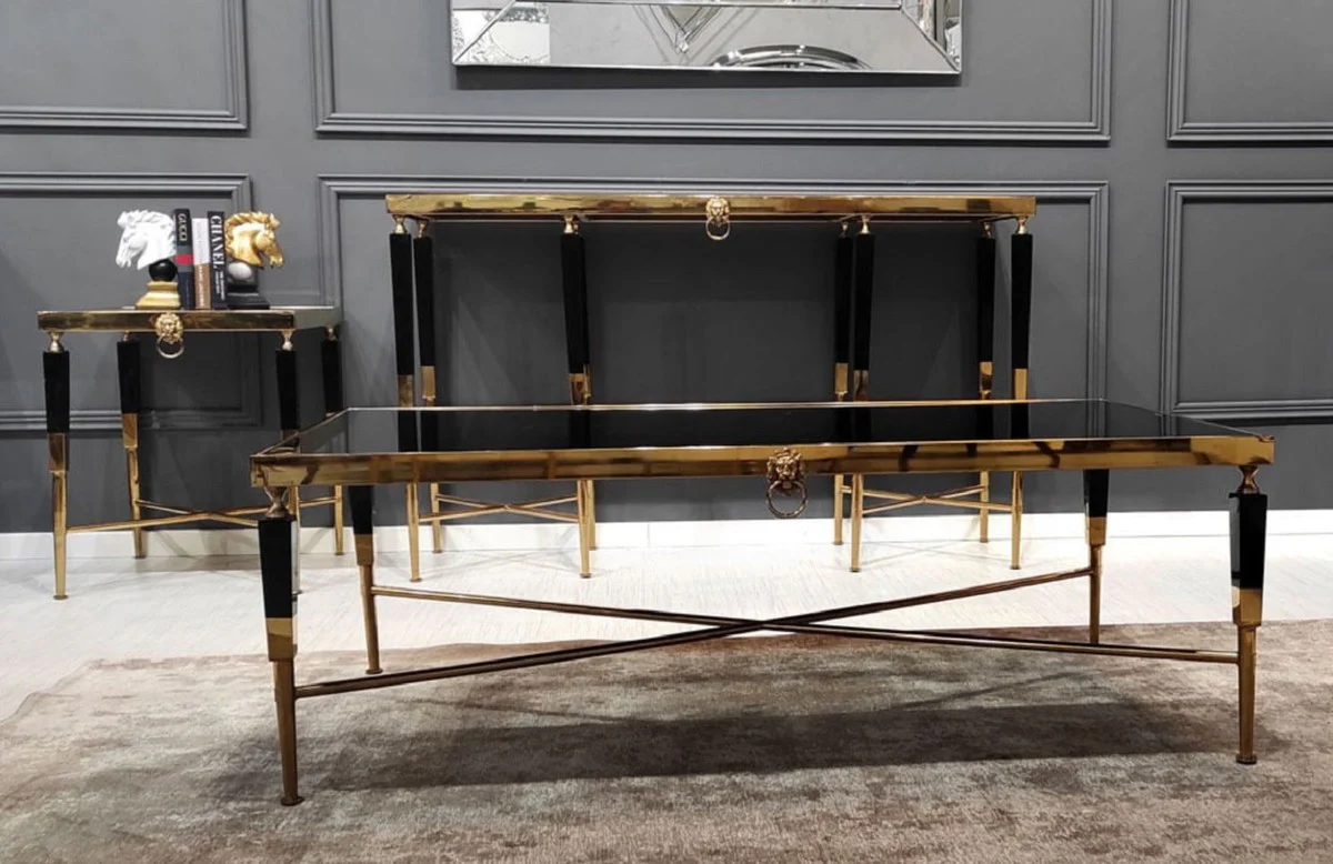 Casa Padrino mesa de centro de lujo negro / oro 130 x 70 x A. 45 cm - Mesa de sal¨®n con tablero de m¨¢rmol artificial - Muebles de sal¨®n de lujo - Muebles de hotel - Interior de lujo