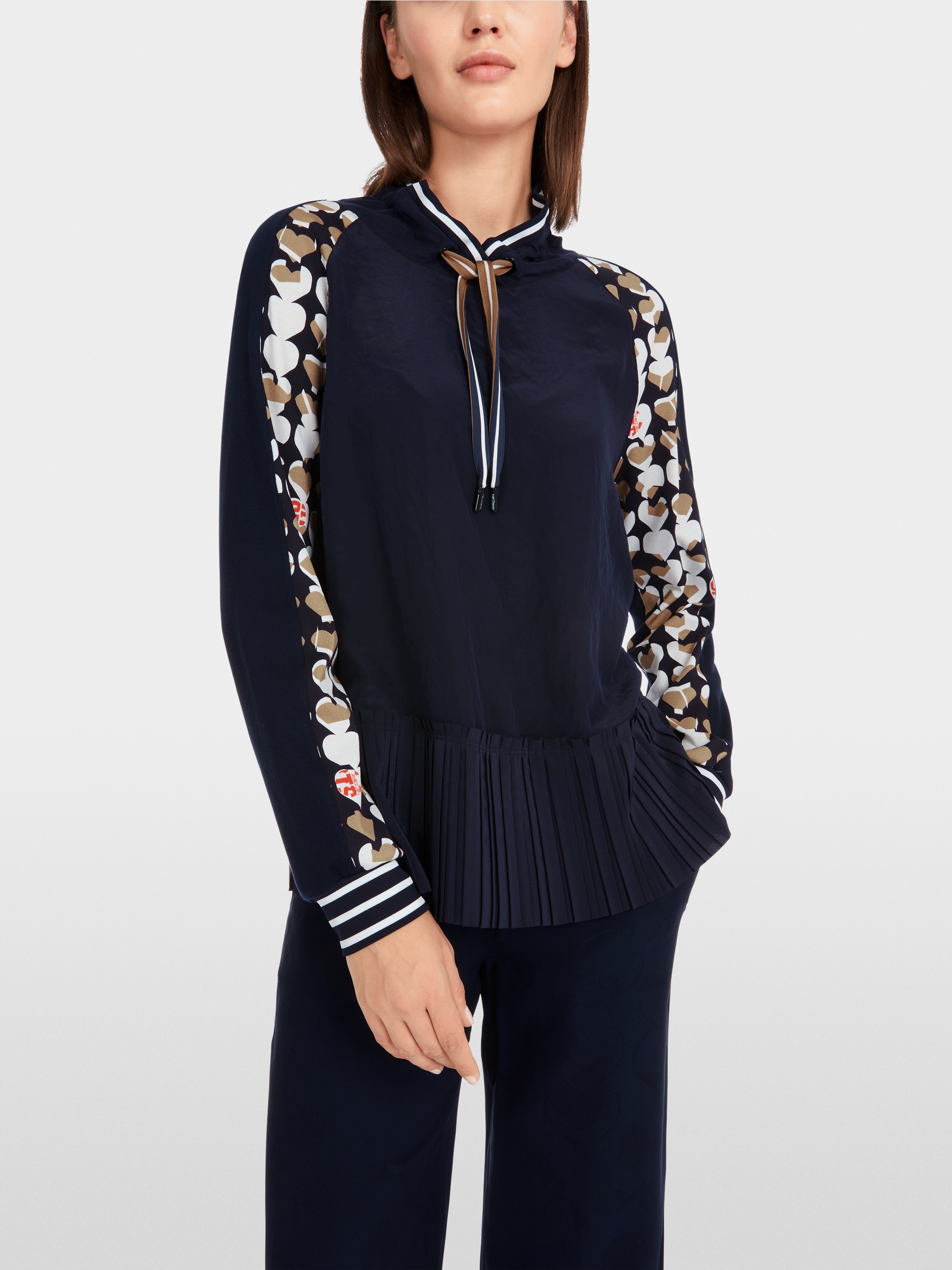 Marc-Cain Loose blouse with pleated peplum