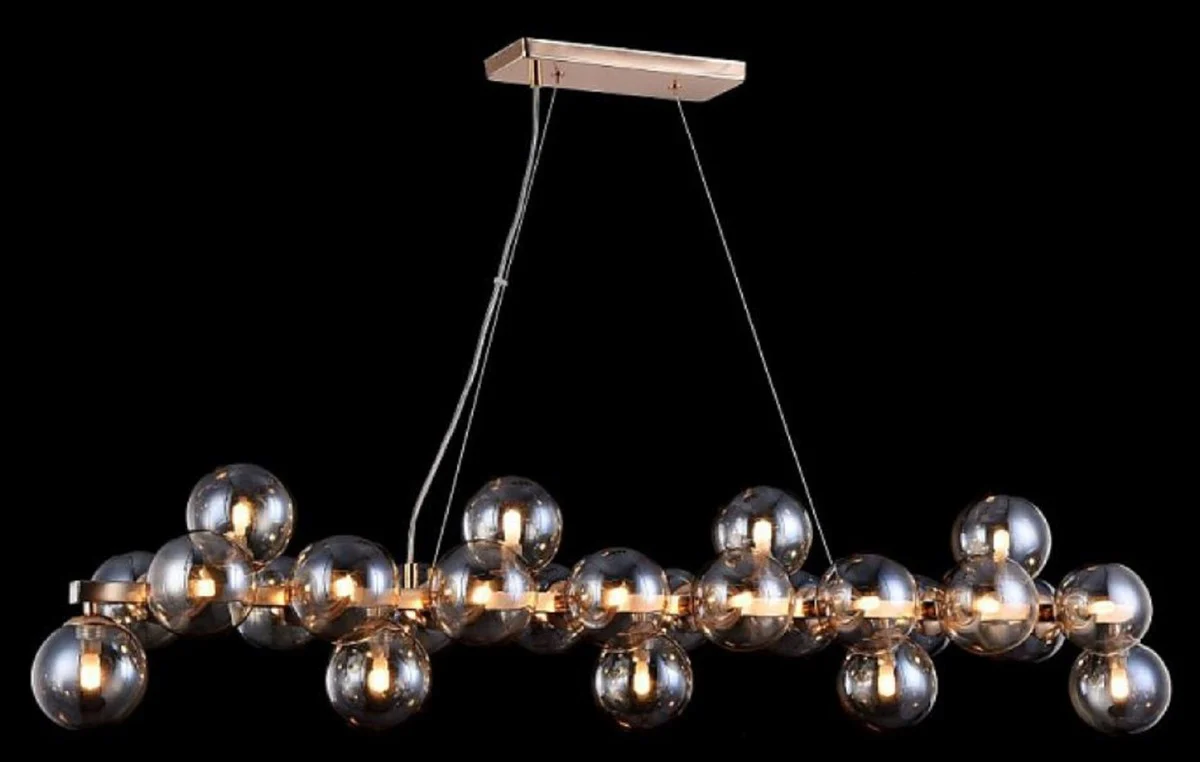 Casa Padrino lámpara colgante de diseño oro 123,5 x 23,8 x H. 22,8 cm - Lámpara de salón moderna con vidrio ámbar