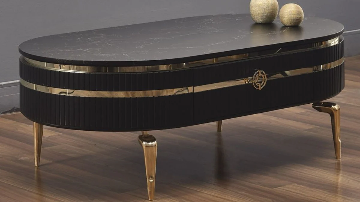 Casa Padrino mesa de centro Art Deco de lujo negro / oro 120 x 67 x A. 42 cm - Mesa de sal¨®n ovalada con caj¨®n y tapa de m¨¢rmol artificial - Muebles de sal¨®n - Muebles Art Deco - Muebles de lujo