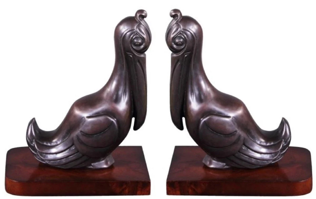 Casa Padrino conjunto de sujetalibros de lujo pelícanos bronce / marrón 18 x 12 x H. 22 cm - Figuras de Bronce Decorado con Base de Madera