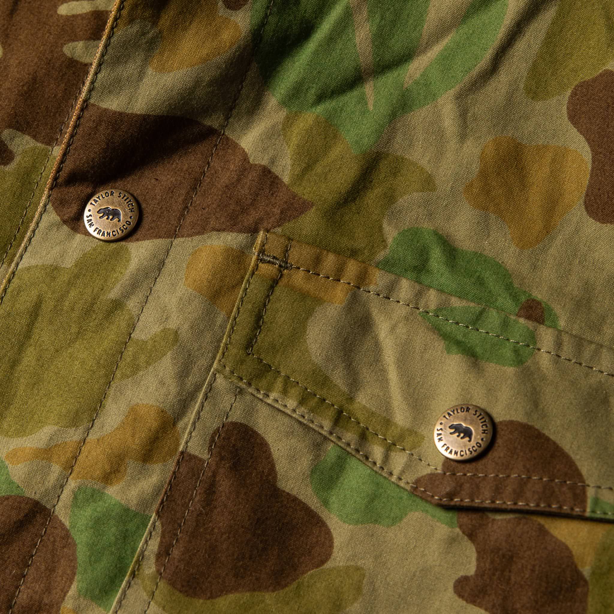 The Taylor Stitch x Gear Patrol Reversible Lombardi Jacket in Arid Camo