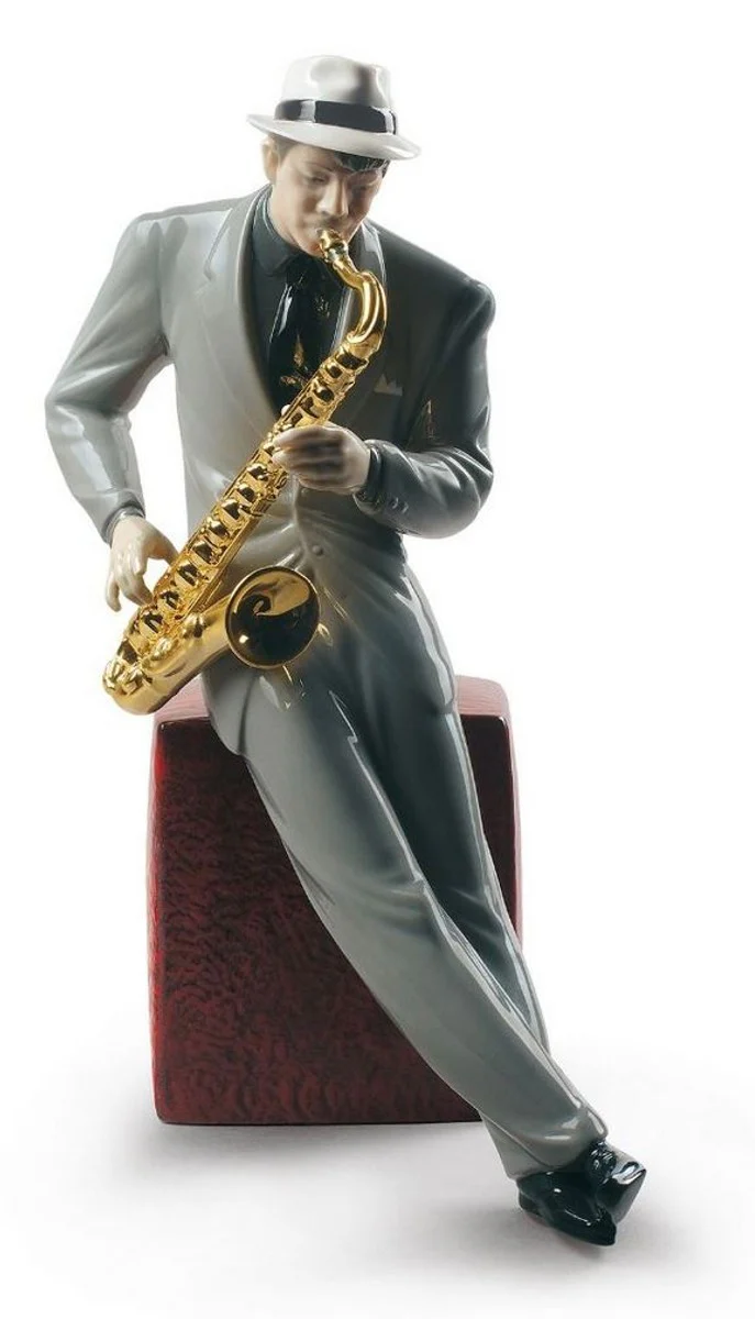 Casa Padrino Porcelain Sculpture Jazz Saxophonist Multicolor 23 x H. 29 cm - Handmade & Hand Painted Luxury Deco Figurine