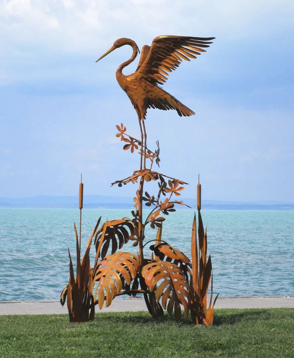 Casa Padrino escultura de jardín de lujo de acero garza en rama oxido 103 x 108 x A. 218 cm - Figura de decoración de jardín hecha a mano - Decoración de jardín de lujo