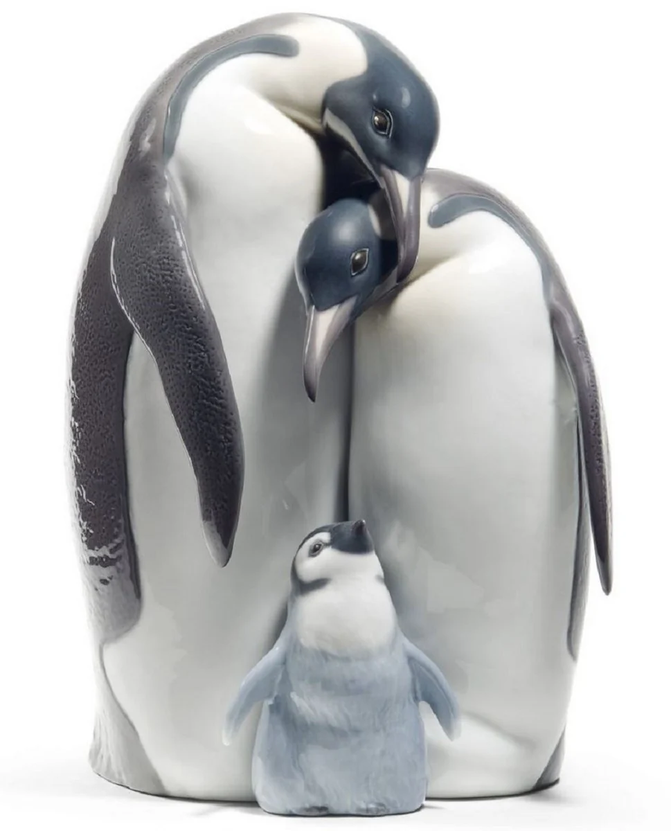 Casa Padrino figurita / escultura de porcelana de lujo pingüino familia multicolor 16 x H. 25 cm - Colección de Lujo