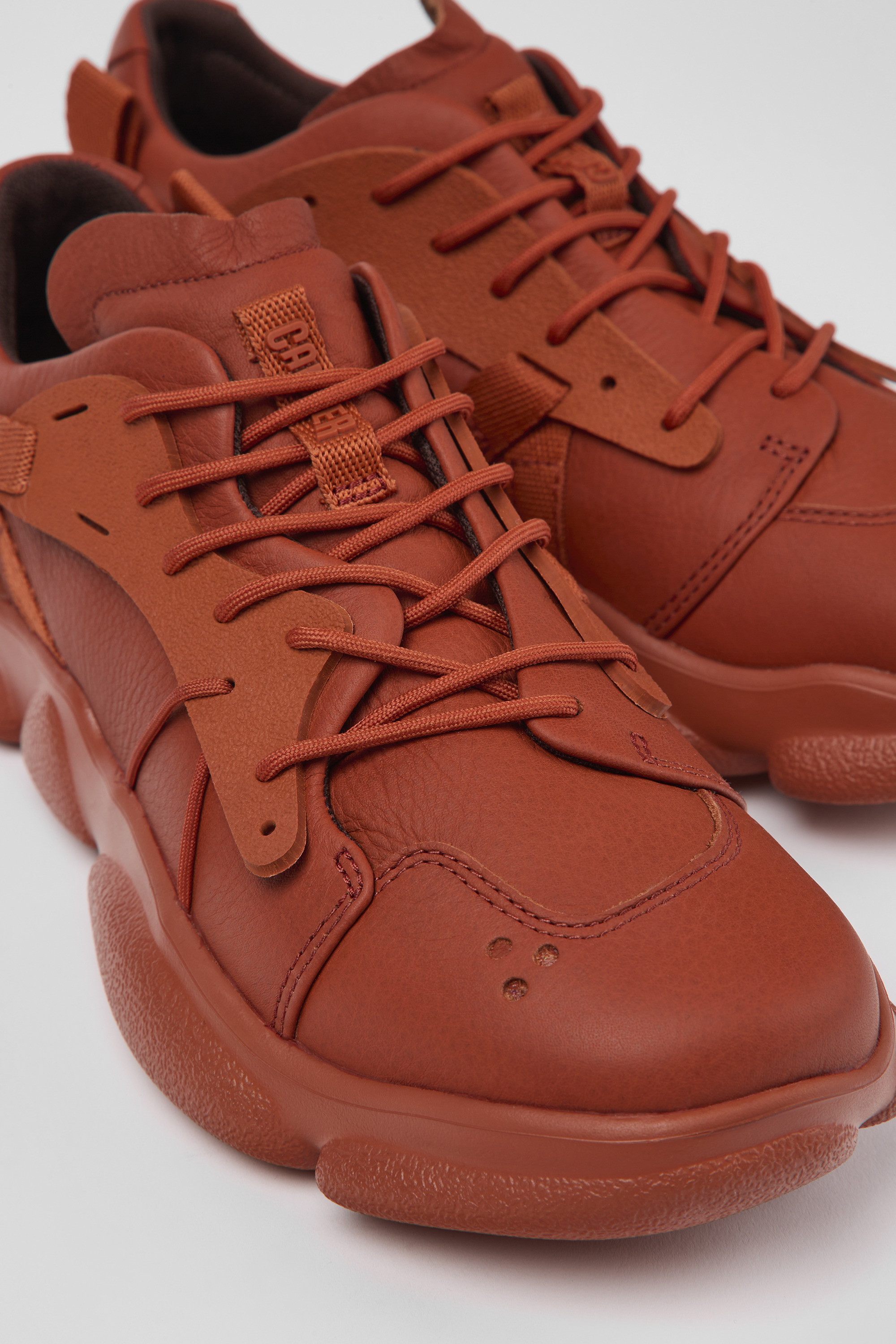 Karst - Red leather and textile sneakers for women