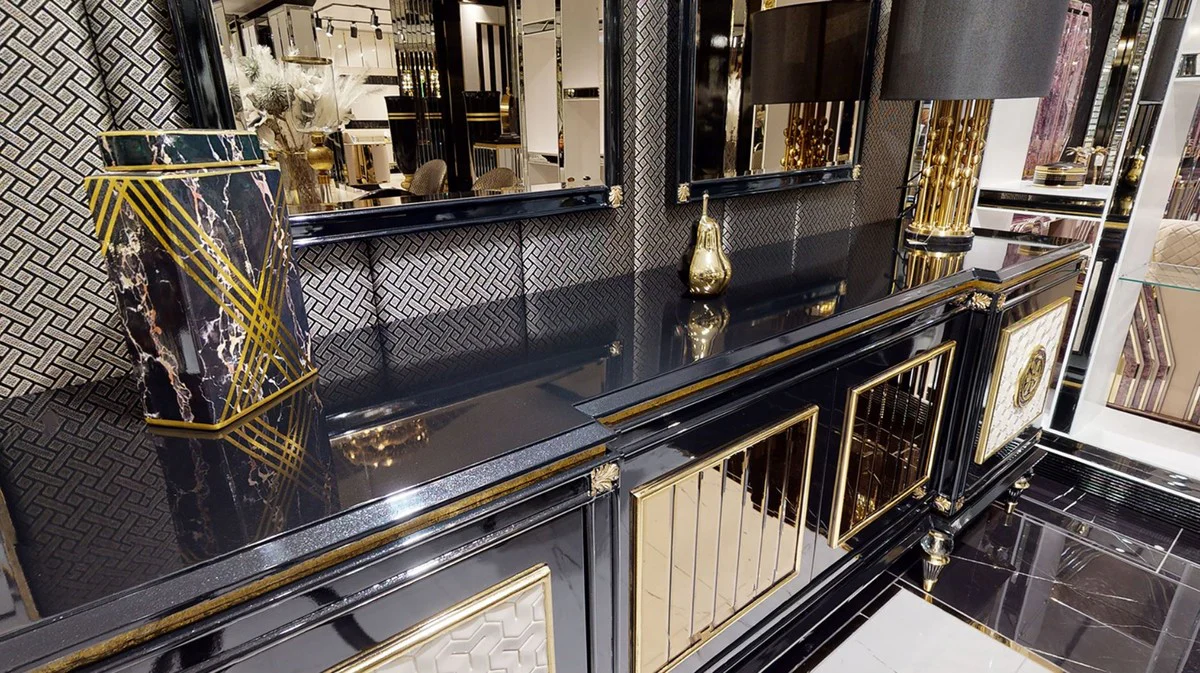 Casa Padrino aparador Art Deco de lujo negro / blanco / oro - Magn¨ªfico armario de madera maciza con 4 puertas - Muebles para Sal¨®n y Hotel Art Deco de Lujo