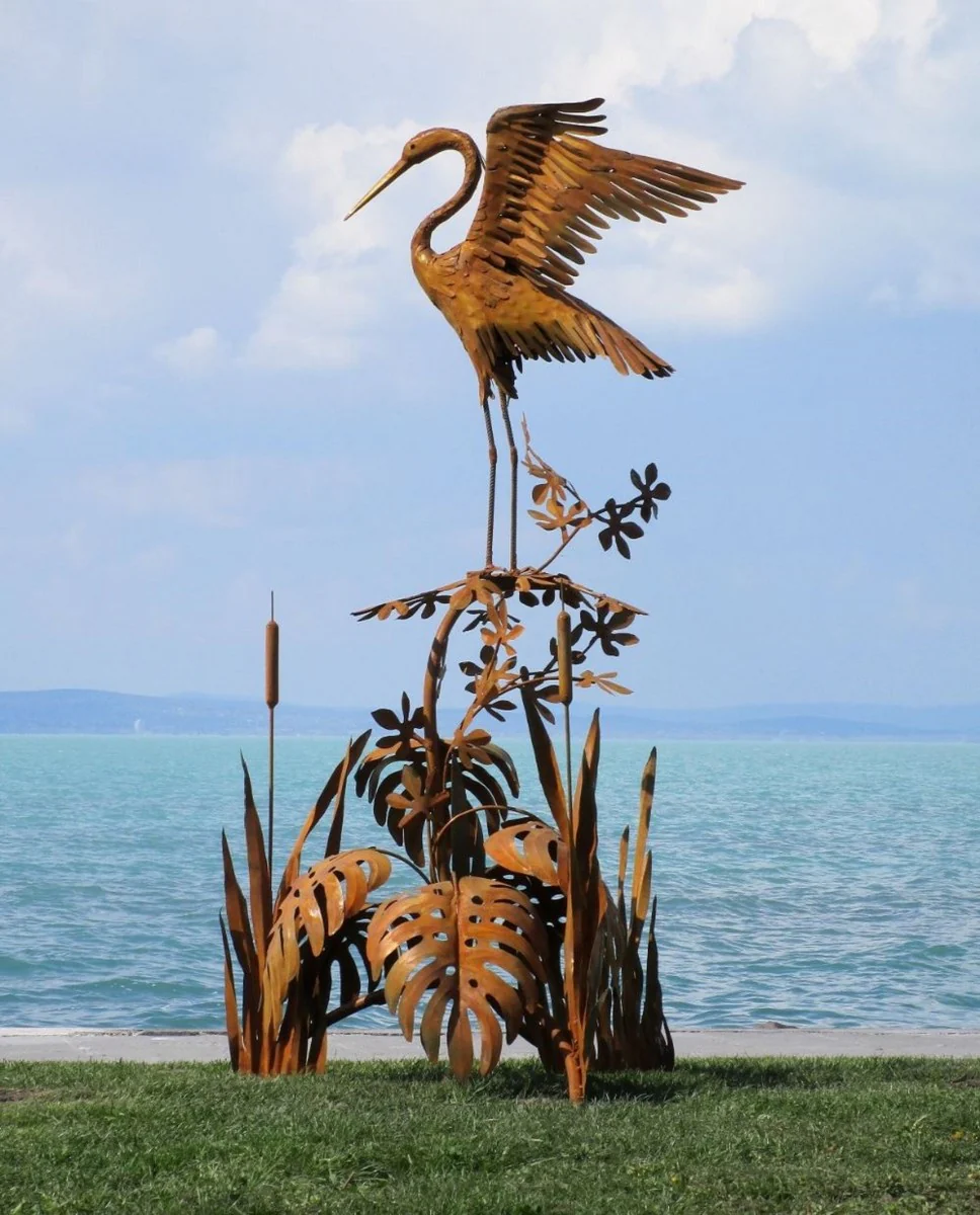 Casa Padrino escultura de jardín de lujo de acero garza en rama oxido 103 x 108 x A. 218 cm - Figura de decoración de jardín hecha a mano - Decoración de jardín de lujo