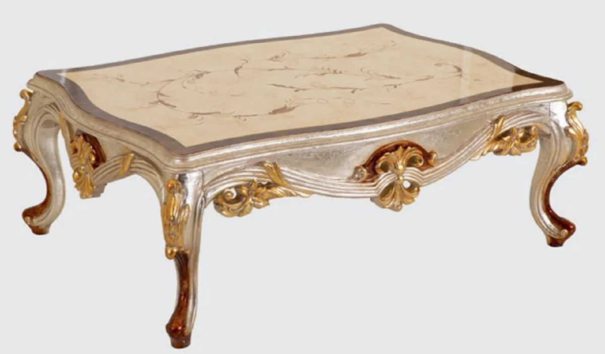Casa Padrino mesa de centro barroco de lujo crema / plata / marr¨®n / oro 125 x 90 x A. 45 cm - Mesa de sal¨®n de madera maciza hecha a mano en estilo barroco - Muebles Barrocos