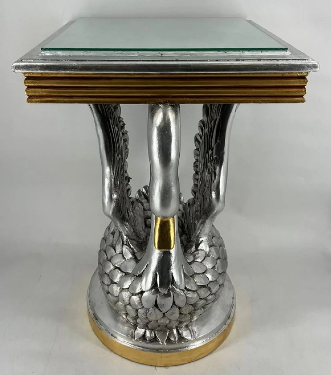 Casa Padrino mesa auxiliar barroco cisne con tapa de vidrio plata / oro A. 78 cm - Muebles barrocos