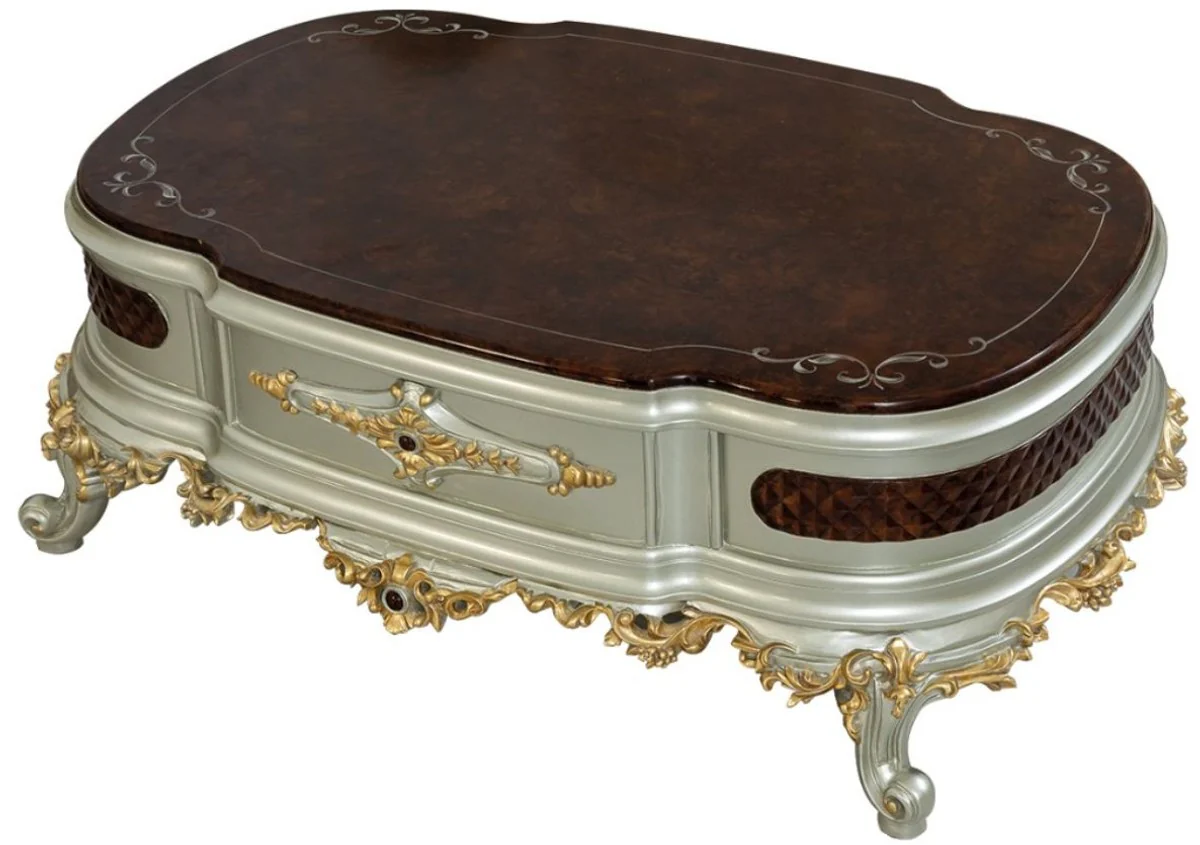 Casa Padrino mesa de centro barroco de lujo marr¨®n oscuro / plata / oro 132 x 95 x A. 50 cm - Mesa de sal¨®n de madera maciza magn¨ªfica - Muebles Barrocos