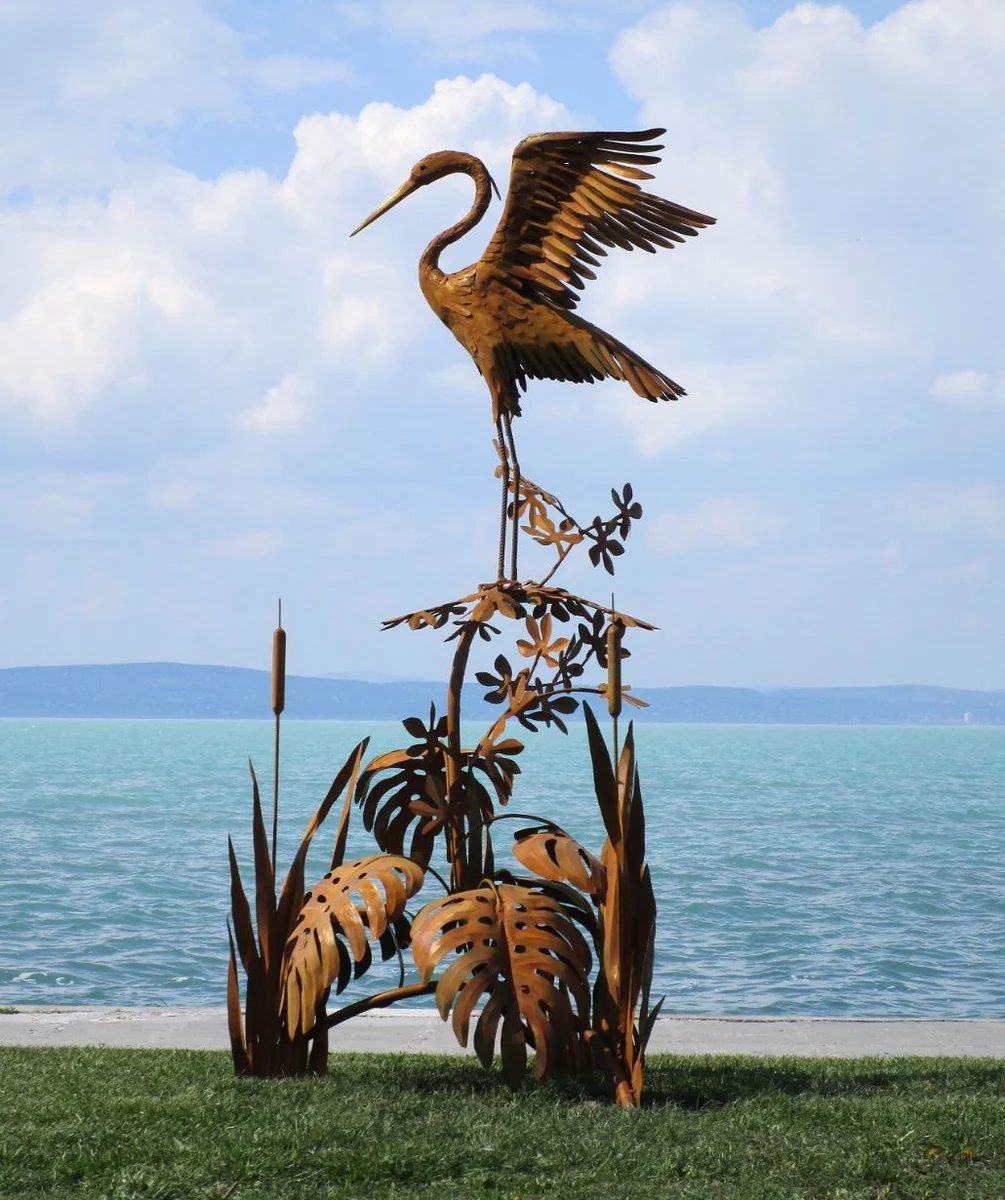 Casa Padrino escultura de jardín de lujo de acero garza en rama oxido 103 x 108 x A. 218 cm - Figura de decoración de jardín hecha a mano - Decoración de jardín de lujo