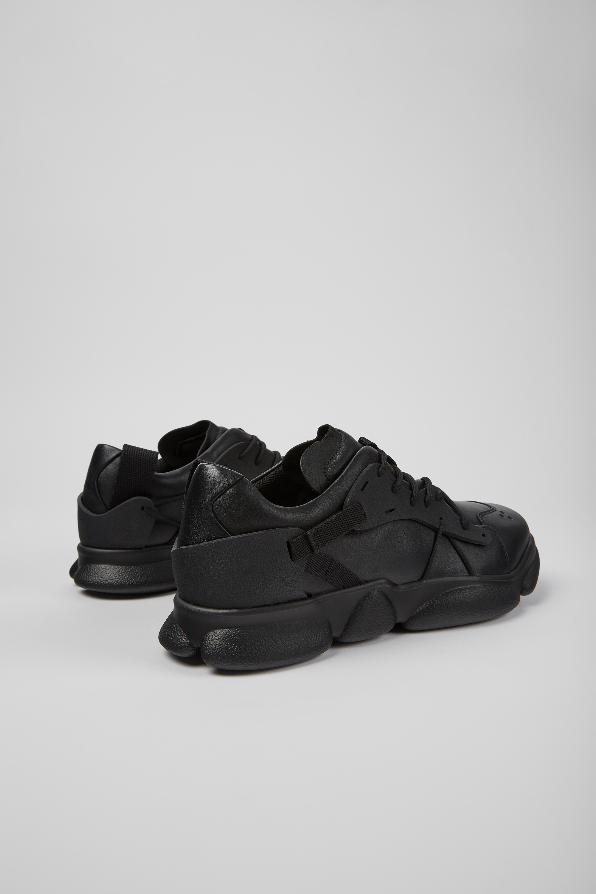 Karst - Black leather and textile sneakers for men