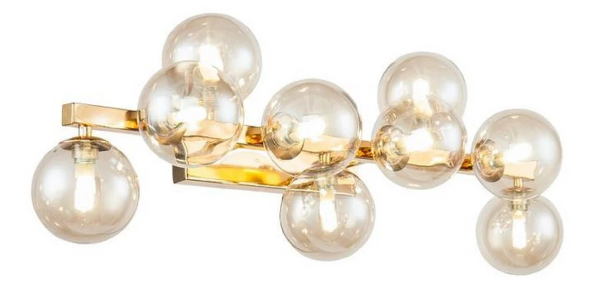 Casa Padrino lámpara de pared de diseñador oro / ámbar 66 x 23 x H. 24 cm - Lámpara de Salón Moderna