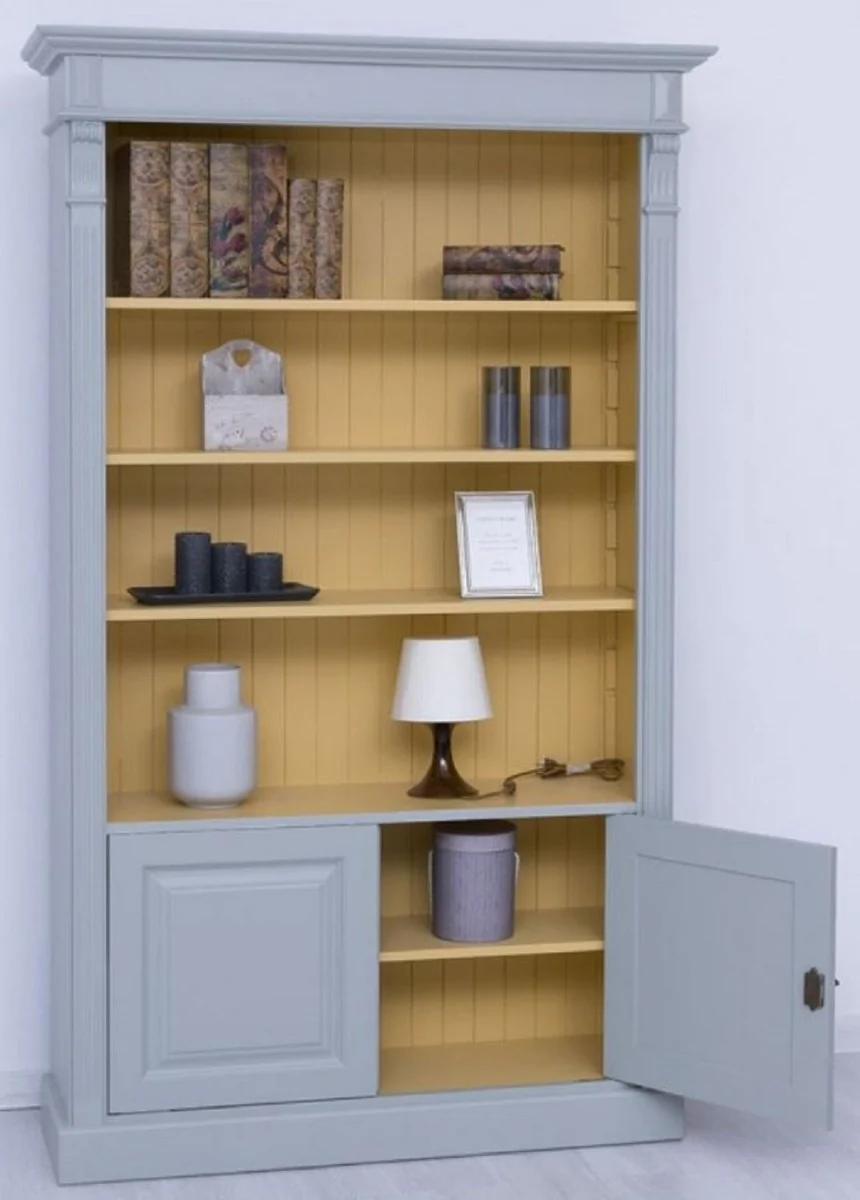 Casa Padrino armario de libros de estilo campestre gris / amarillo 120 x 39 x A. 197 cm - Armario de madera maciza - Armario de sala de estar - Armario de oficina - Muebles de estilo campestre