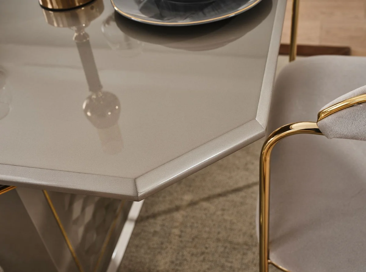 Casa Padrino conjunto de comedor Art Deco de lujo gris / oro - 1 Mesa de Comedor Extensible y 6 Sillas de Comedor con Reposabrazos - Muebles de comedor - Muebles Art Deco - Muebles de lujo