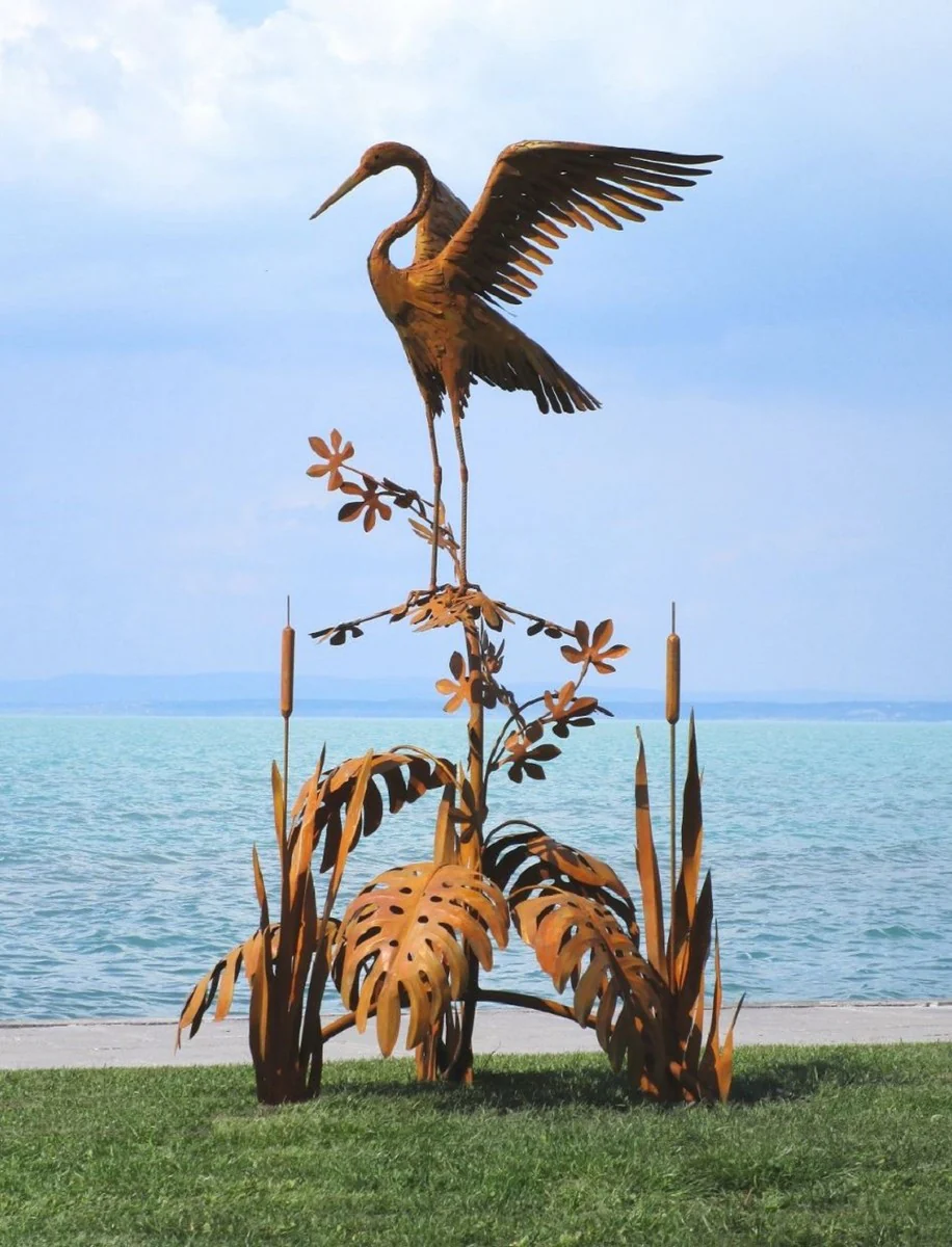 Casa Padrino escultura de jardín de lujo de acero garza en rama oxido 103 x 108 x A. 218 cm - Figura de decoración de jardín hecha a mano - Decoración de jardín de lujo