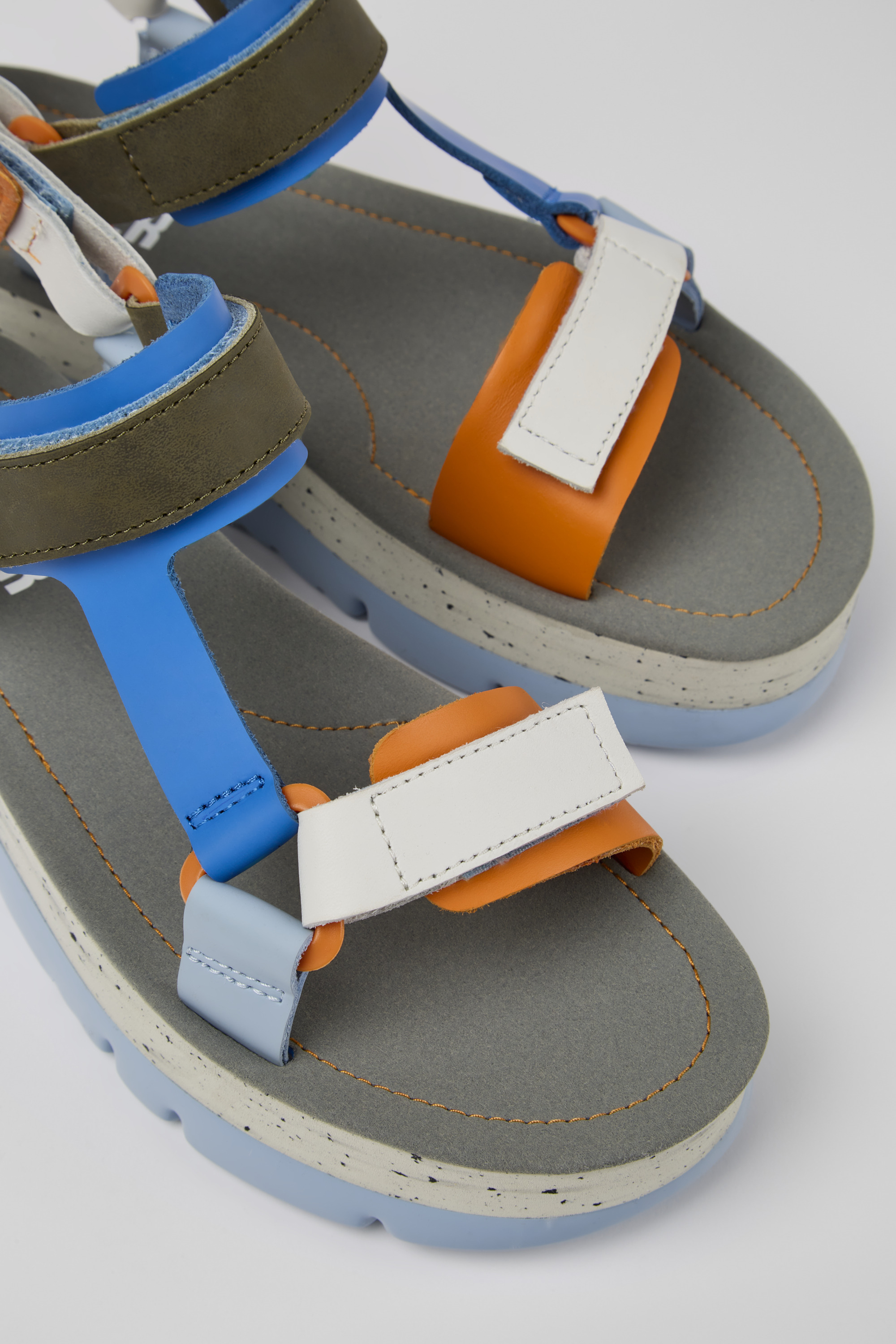 Oruga Up - Blue, orange, and white leather sandals for women